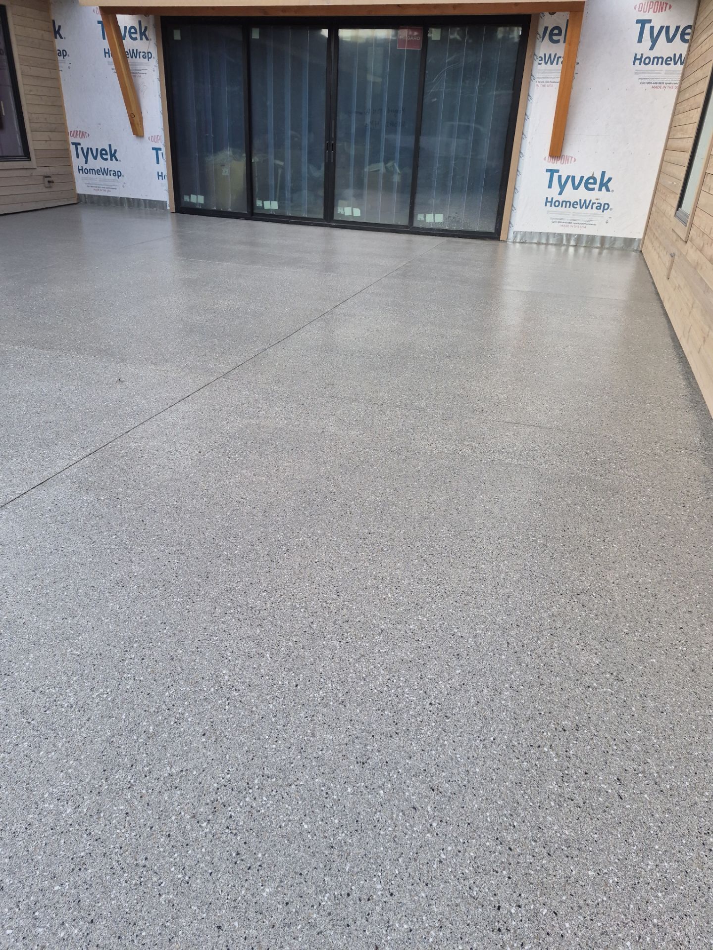 New Construction Concrete Patio and Garage Polyurea Floor Coating in Dover by Croc Coatings, LLC