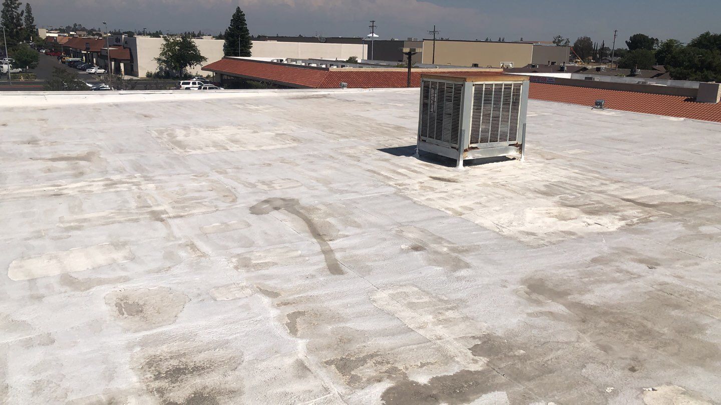 Reburbish existing spray foam job by Straight Edge Roofing Inc