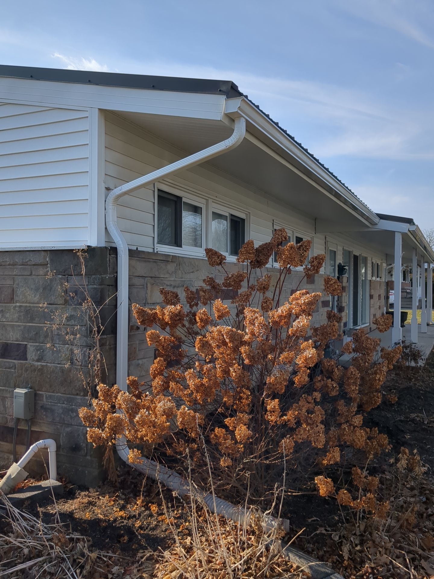 Metal Roofing Installation and Stone Veneer Exterior Refresh in Camp Hill by Esh Builders