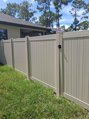 Tan Vinyl Privacy Fence and Gate Installation in Port Charlotte