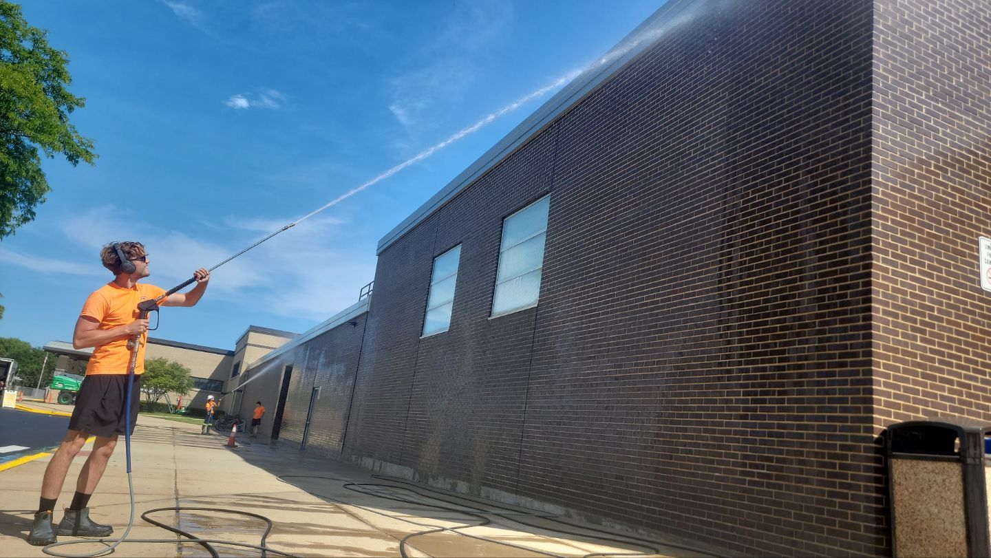 commercial pressure washing using Algaecide, soft wash soap by Northern Power Washing LLC.