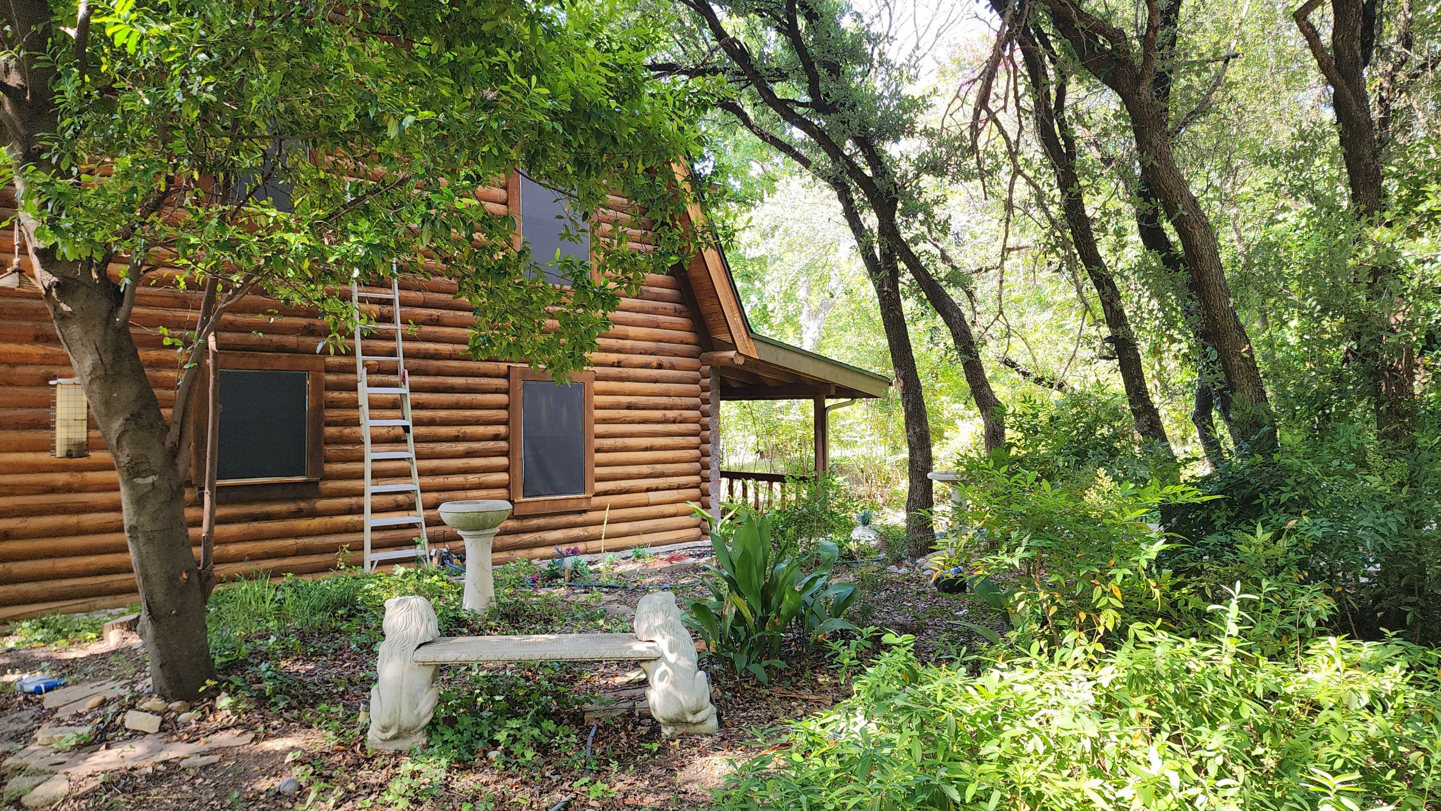 Fort Worth Log Home Roof Replacement and Gutter System Service by Performance 1 Roofing