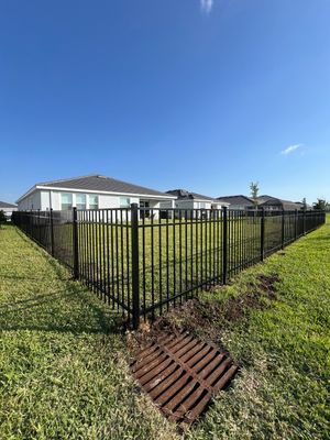 Aluminum Fence Installation using Black 3 Rail Aluminum Fence