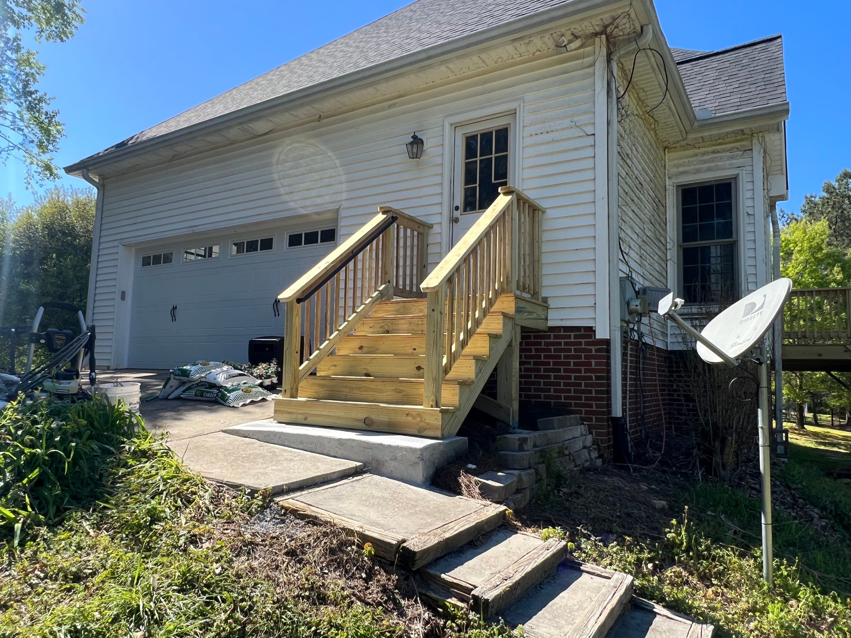Pressure-Treated Wood Deck and Side Porch Replacement in Dacula by Swift Home Renovations