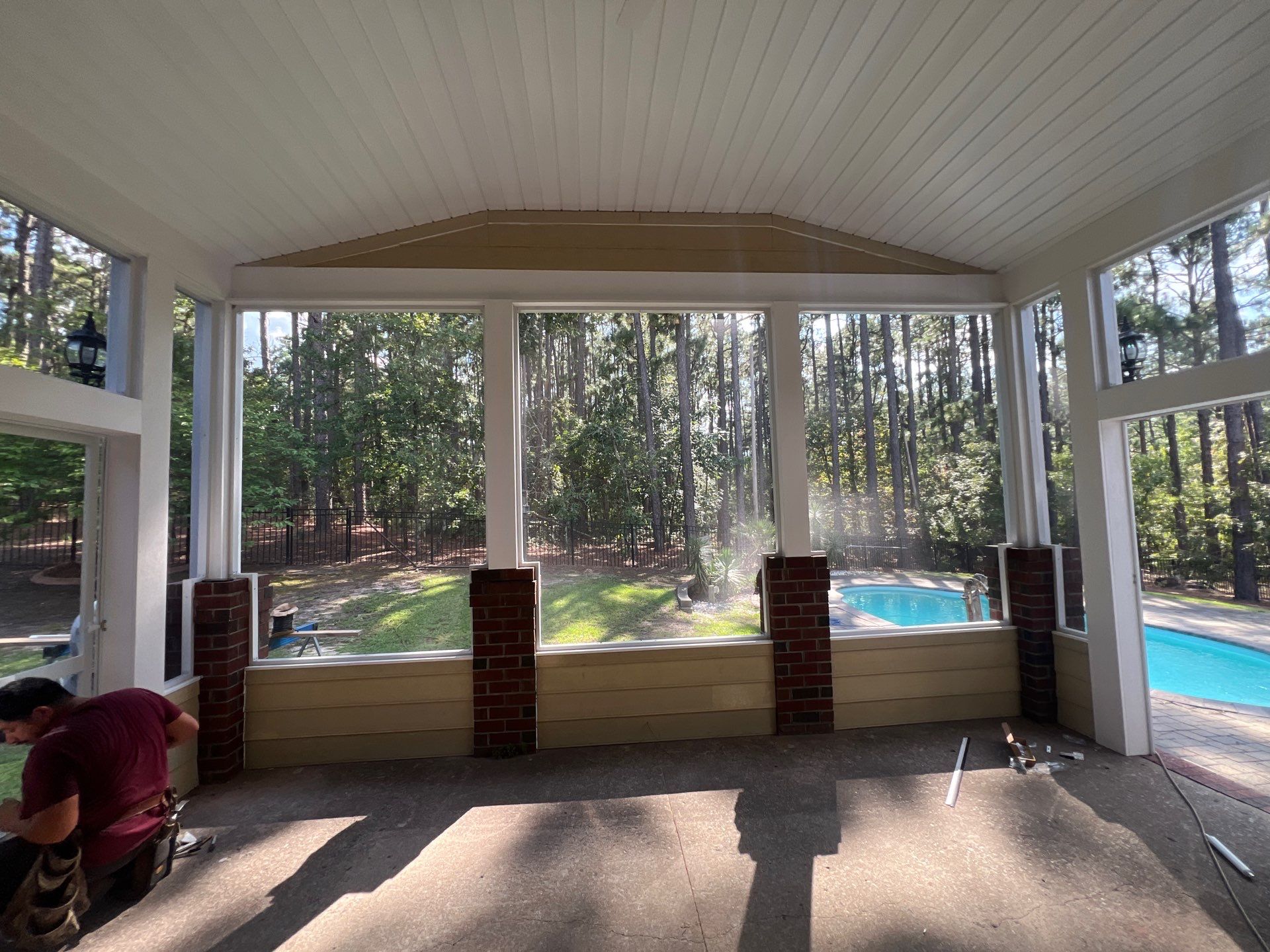 Custom Screened-In Porch Addition with Open Gable Roof in Fayetteville by The Remodeling Company