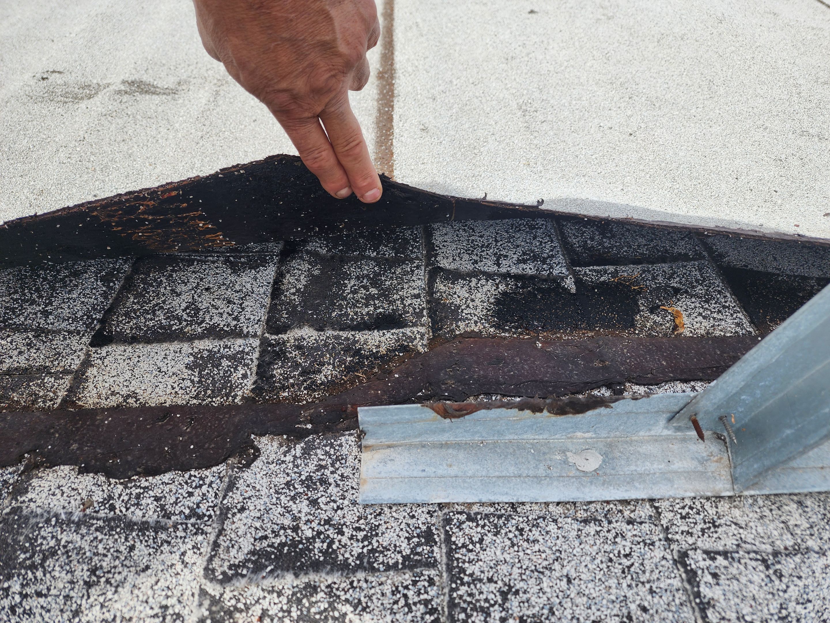 Foam and coatings on commercial roof by Straight Edge Roofing Inc