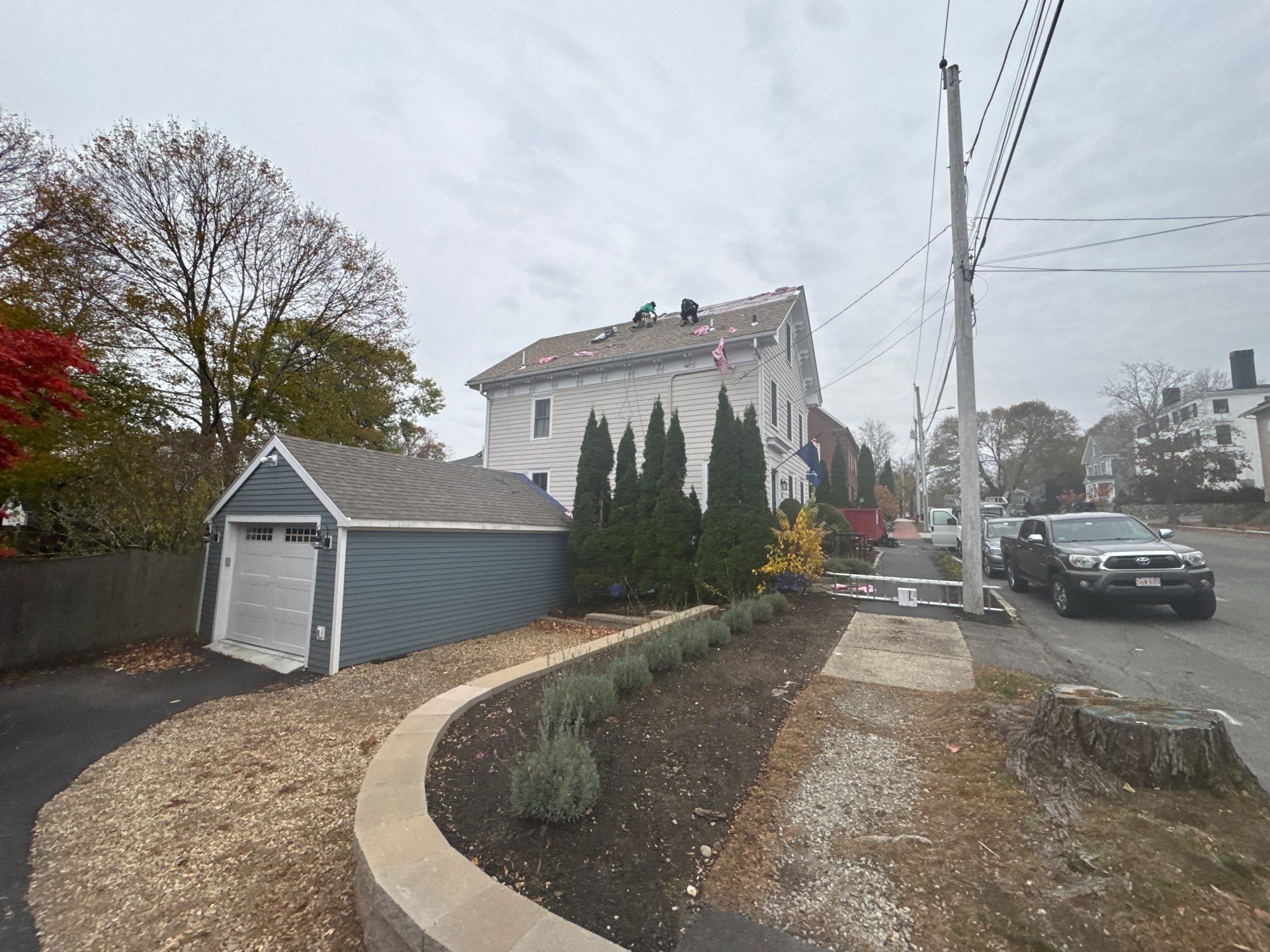 Newburyport Complete Roof Replacement with Solar Venting Skylight by Mighty Dog Roofing of Greater Middlesex County