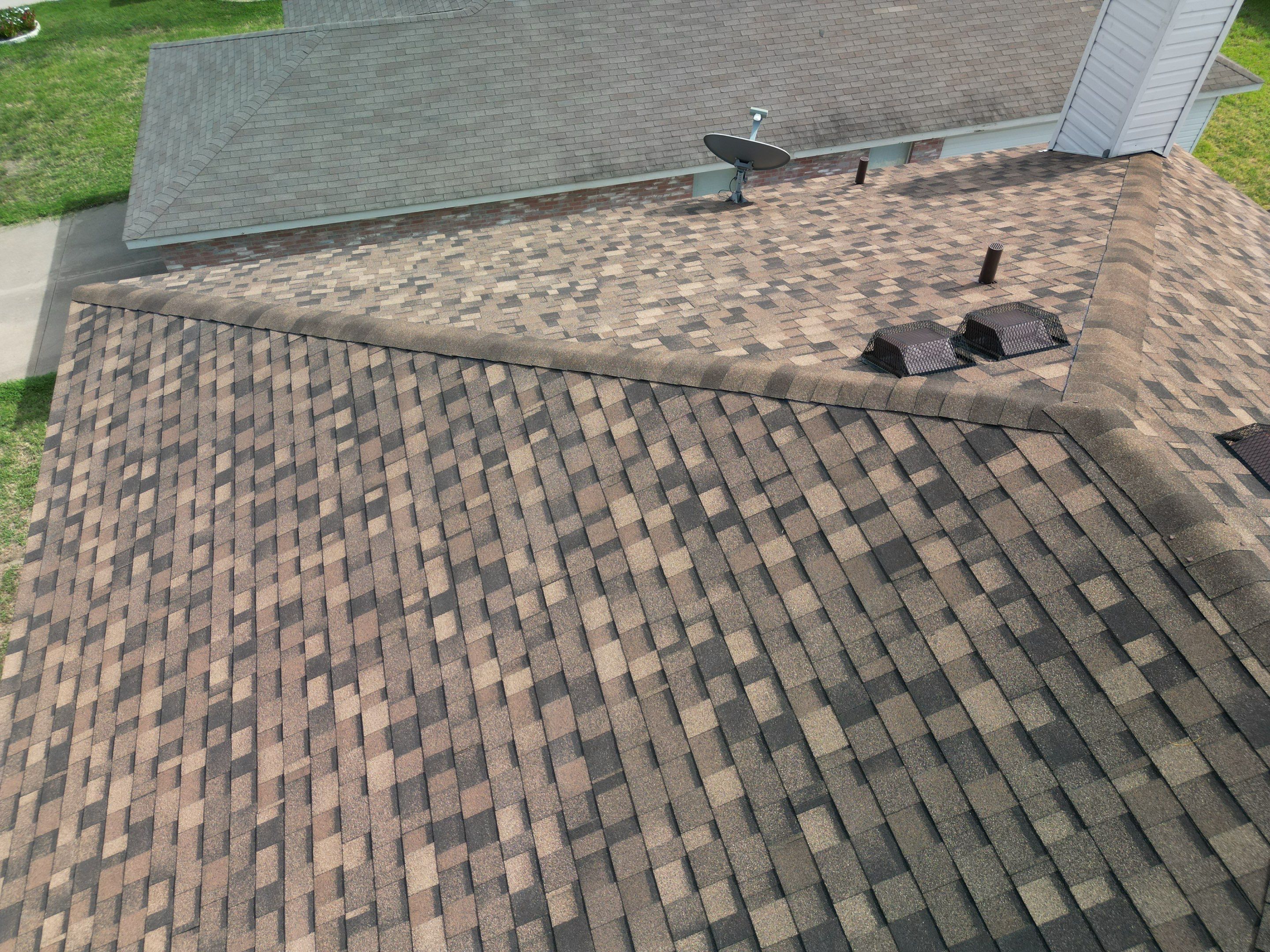 Full Roof Replacement, Chimney Rebuild and Interior Damage Replacement by First United Roofing & Construction