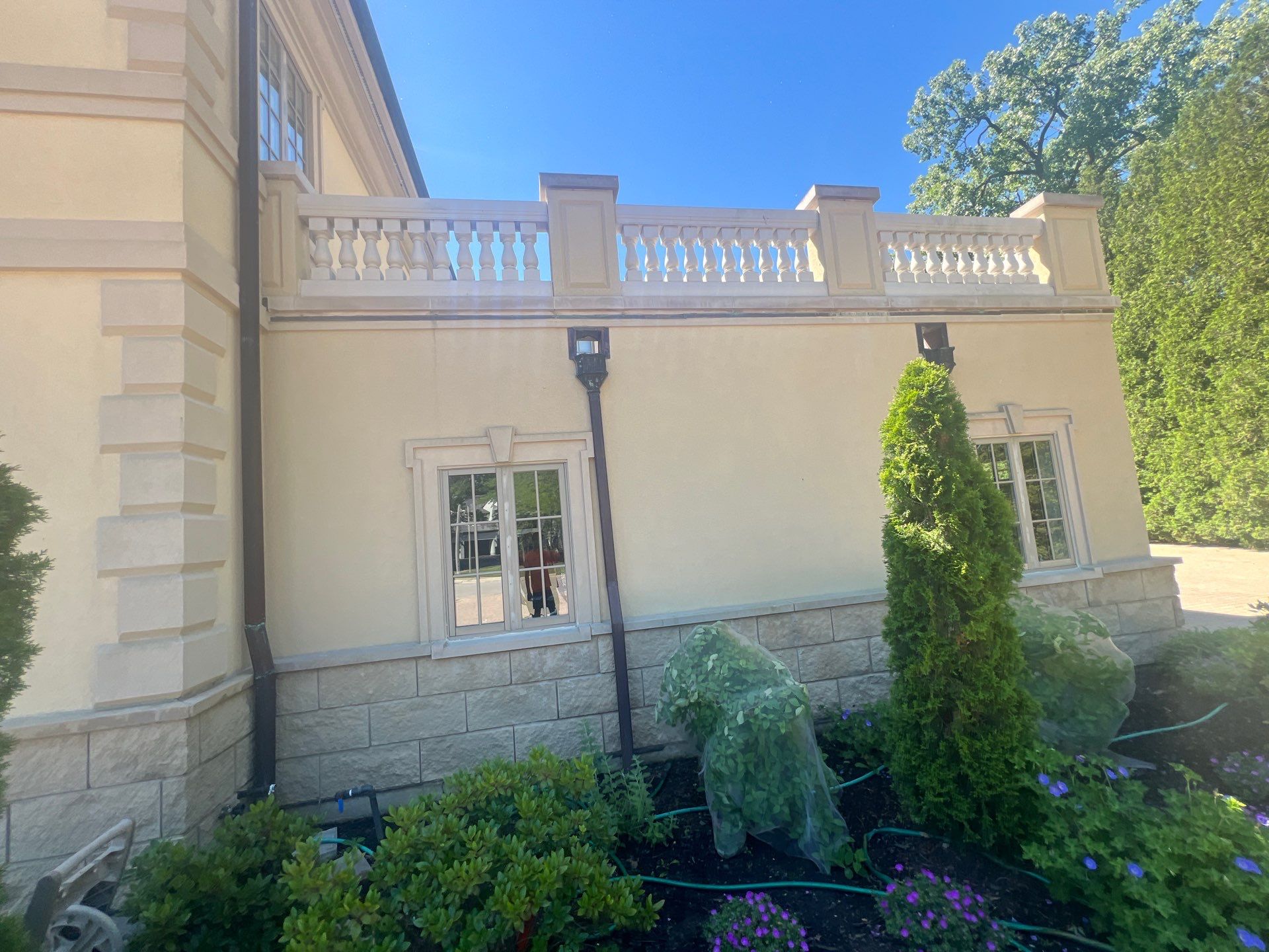 concrete cleaning using Algaecide, soft wash soap by Northern Power Washing LLC.