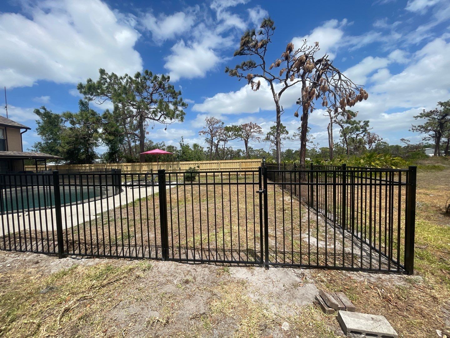 Black Aluminum 3 Rail Fence and Treated Wood Board on Board Privacy Fence  by Asap fence and gates, LLC