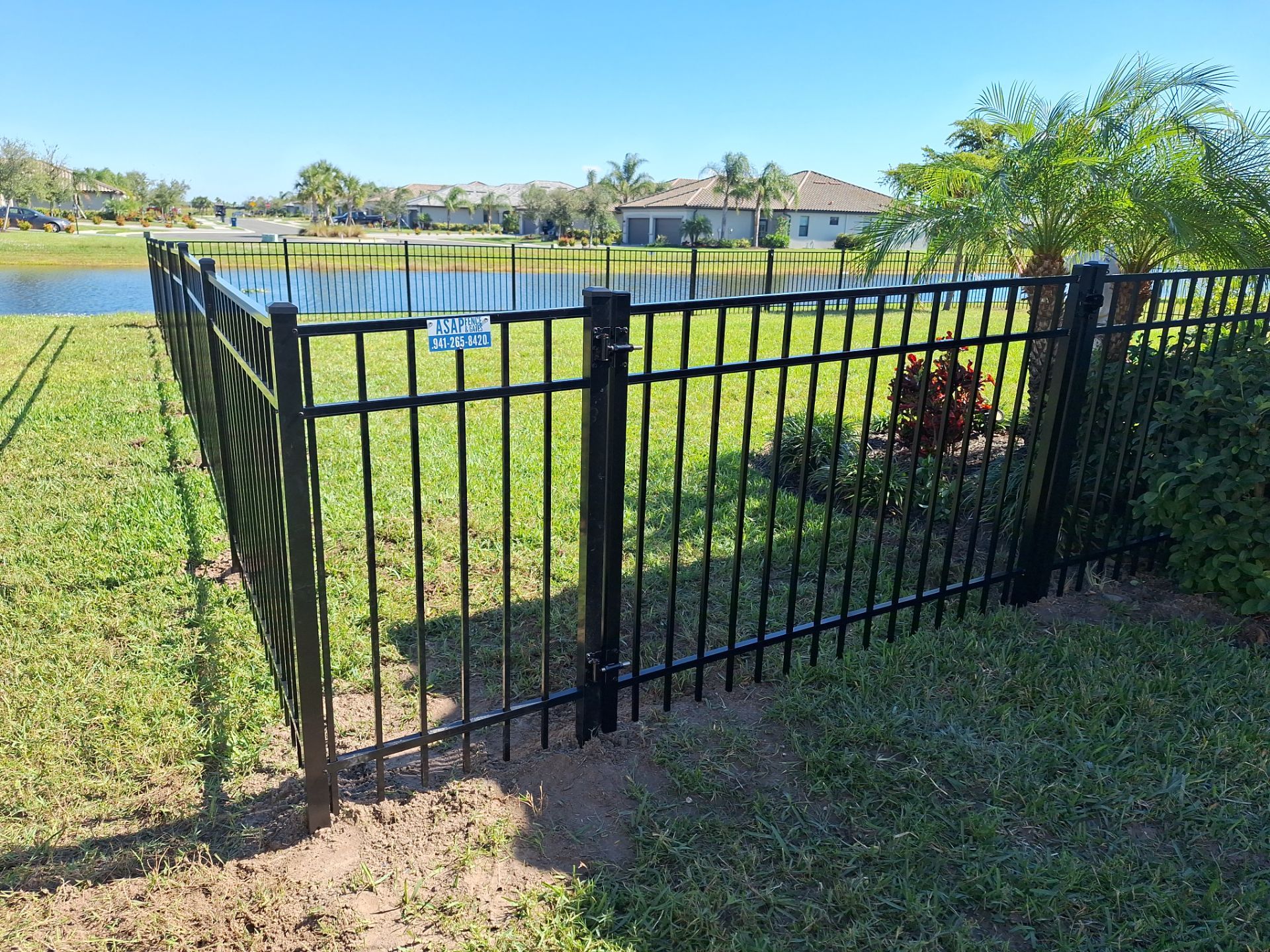 Aluminum Fence Installation using 4ft 3 Rail Black Aluminum Fence by Asap fence and gates, LLC