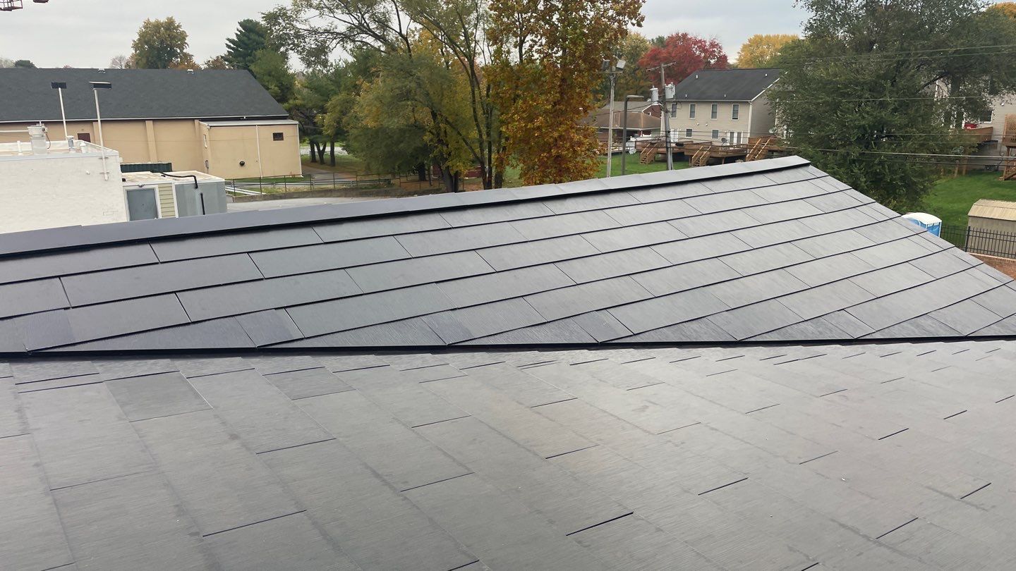 Tesla Solar Roof on a Commercial Building by American Home Contractors