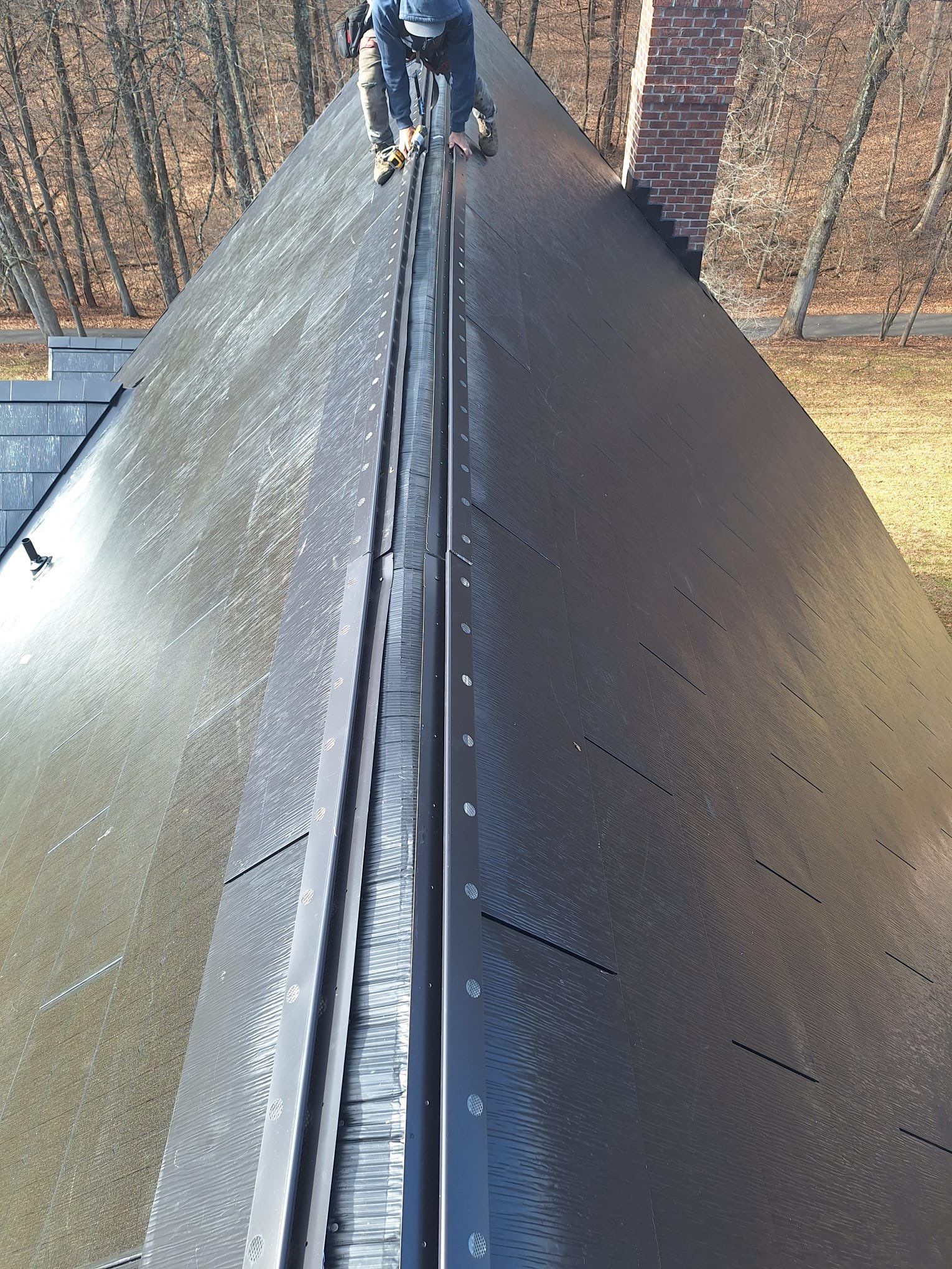 Tesla Solar Roof  using Tesla Powerwall by American Home Contractors