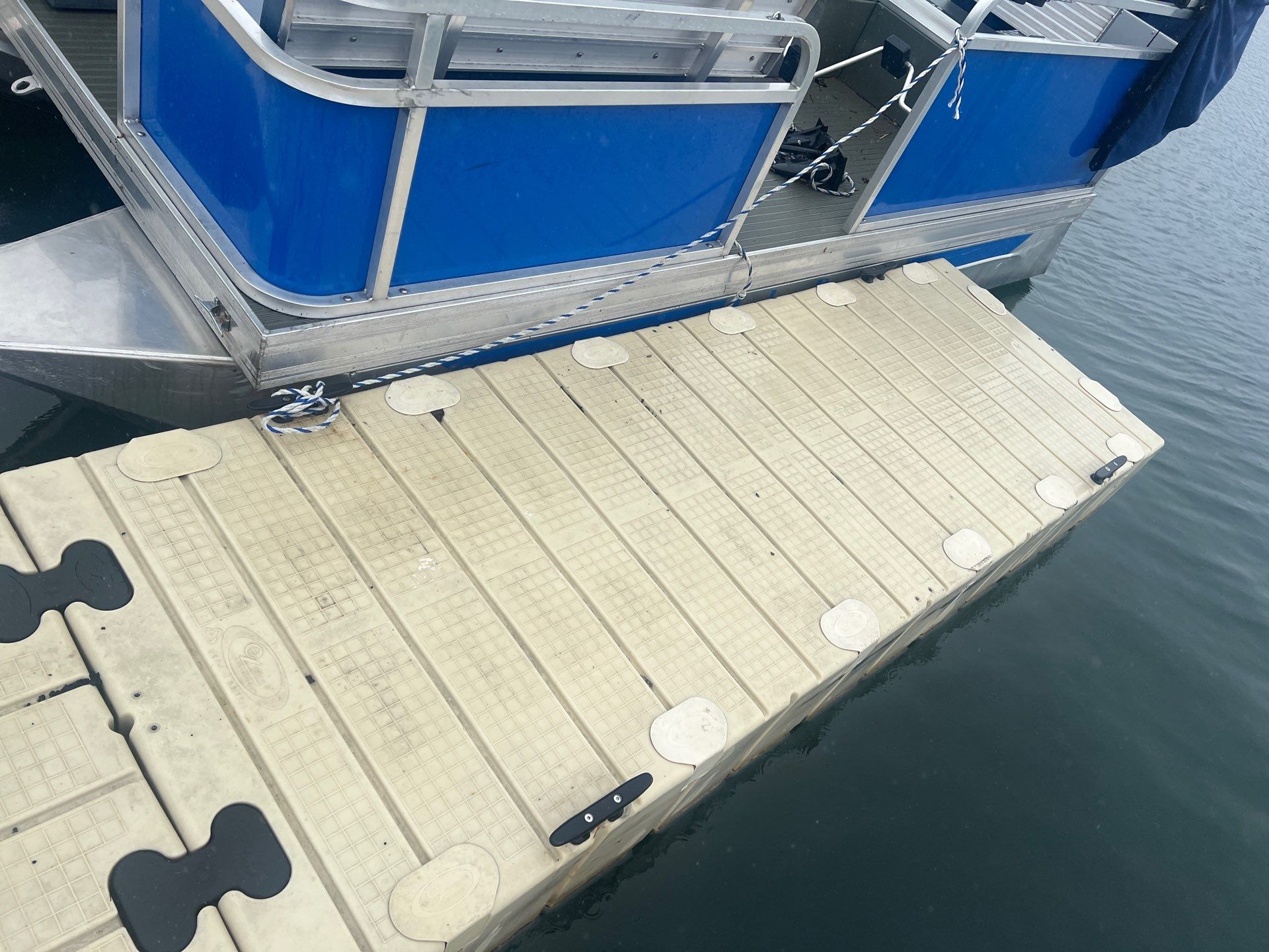 Power washing of floating dock by Northern Power Washing LLC.