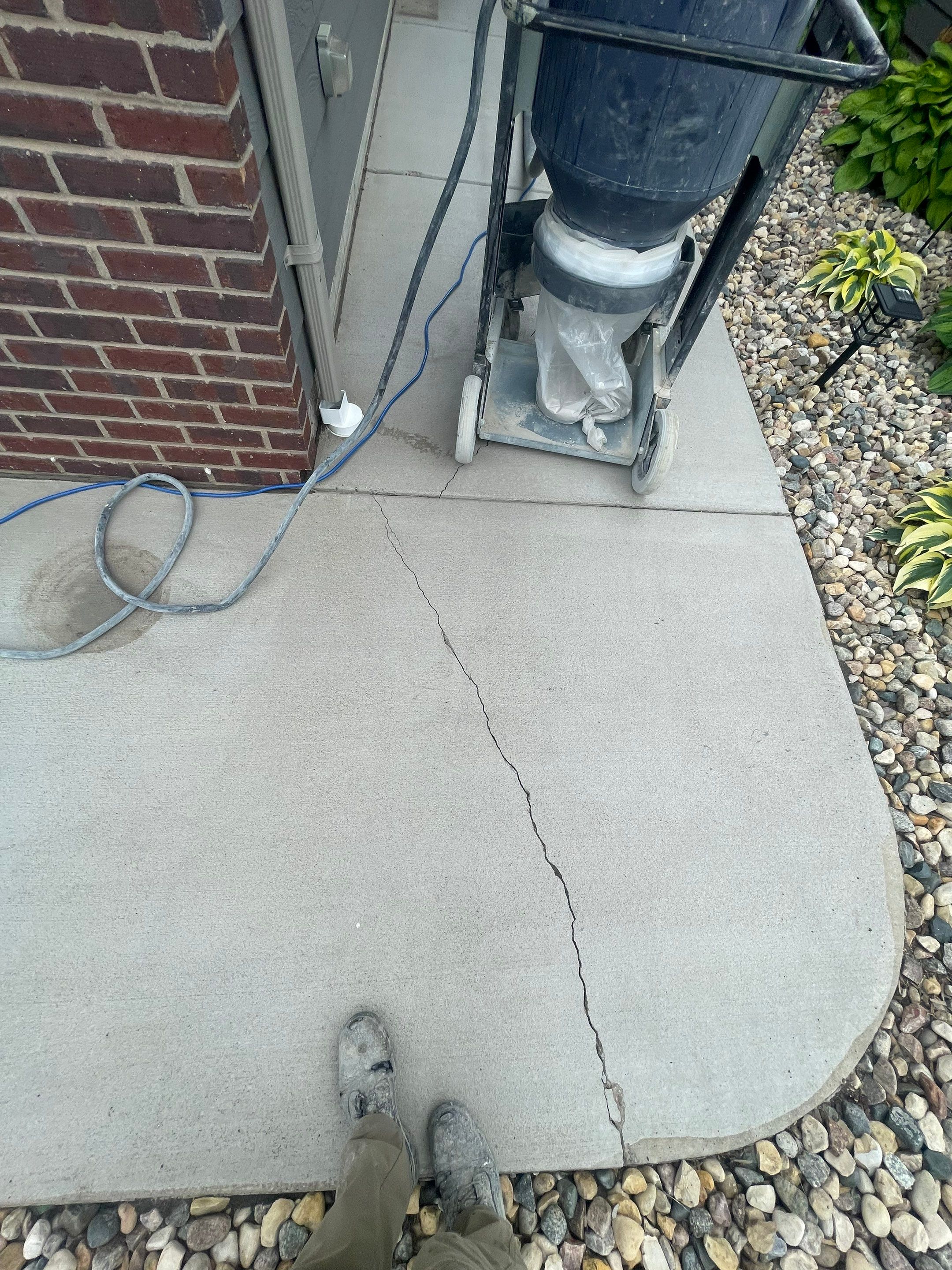 Custom Concrete Coating for Sioux Falls Patio and Front Walkway by Select Painting, Coatings & Garage Cabinets