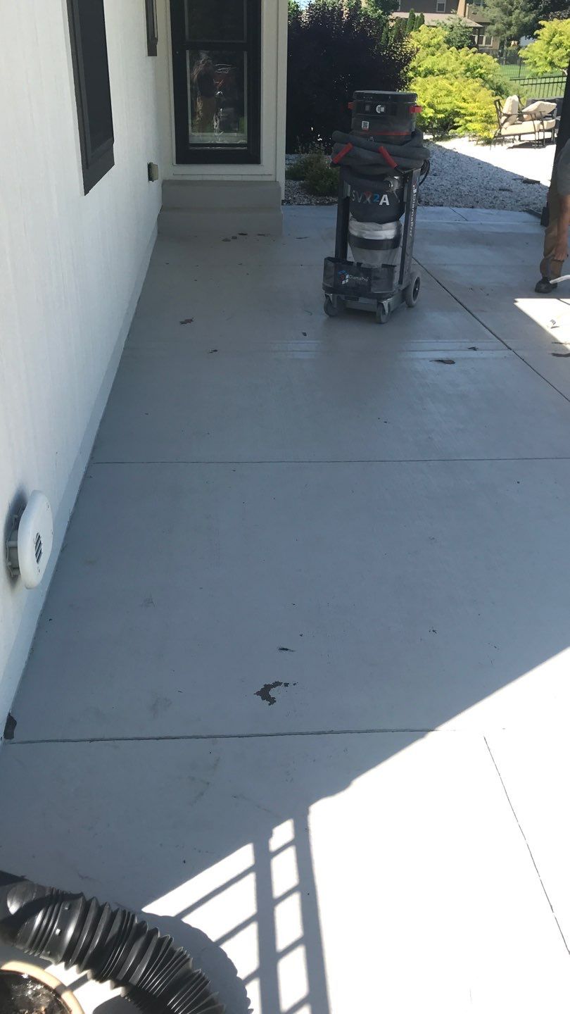 Patio using Slate Stone by Select Painting, Coatings & Garage Cabinets