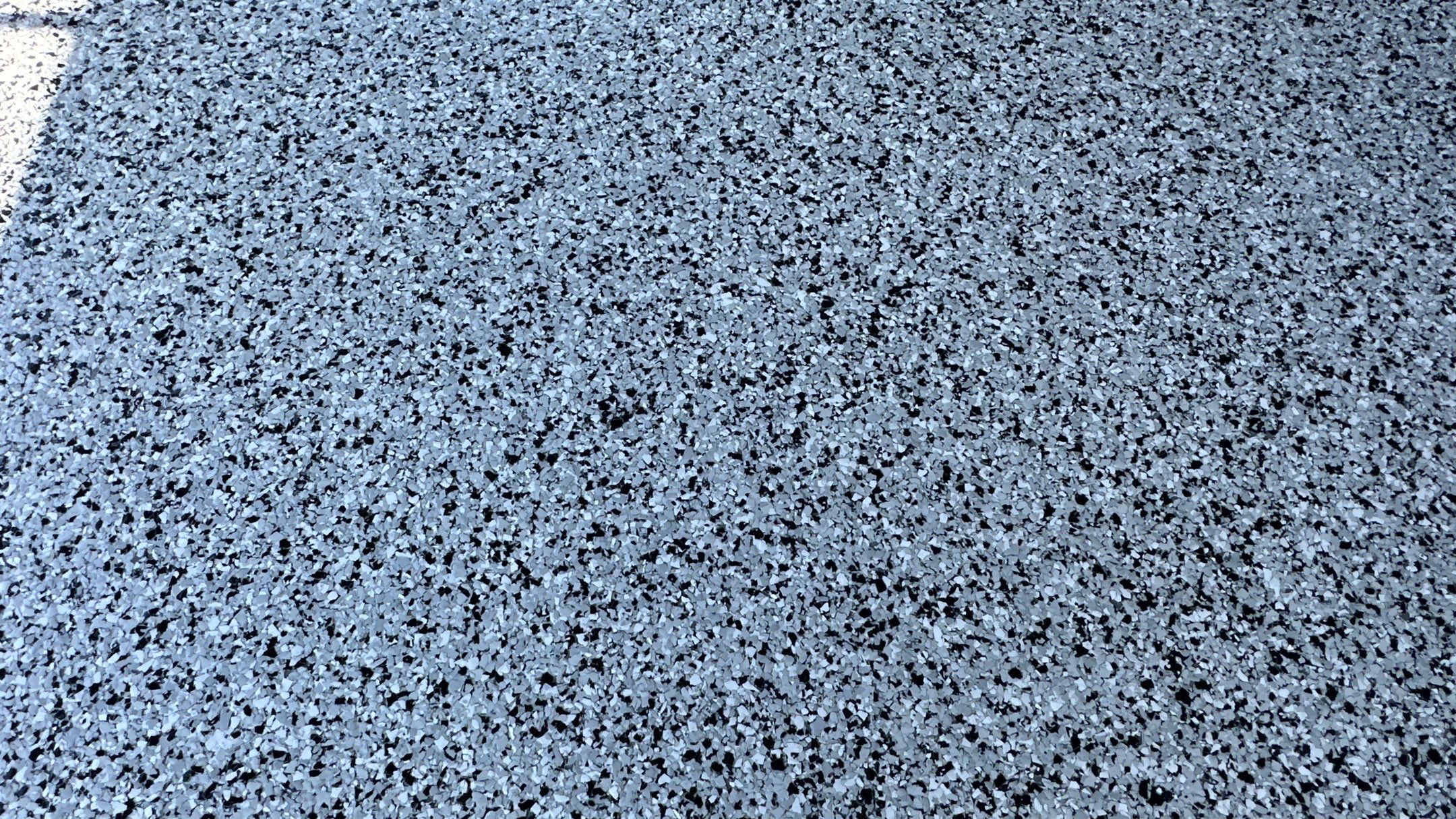 Dennis P. upgraded his garage and patio with a new flake floor by Banner Garage