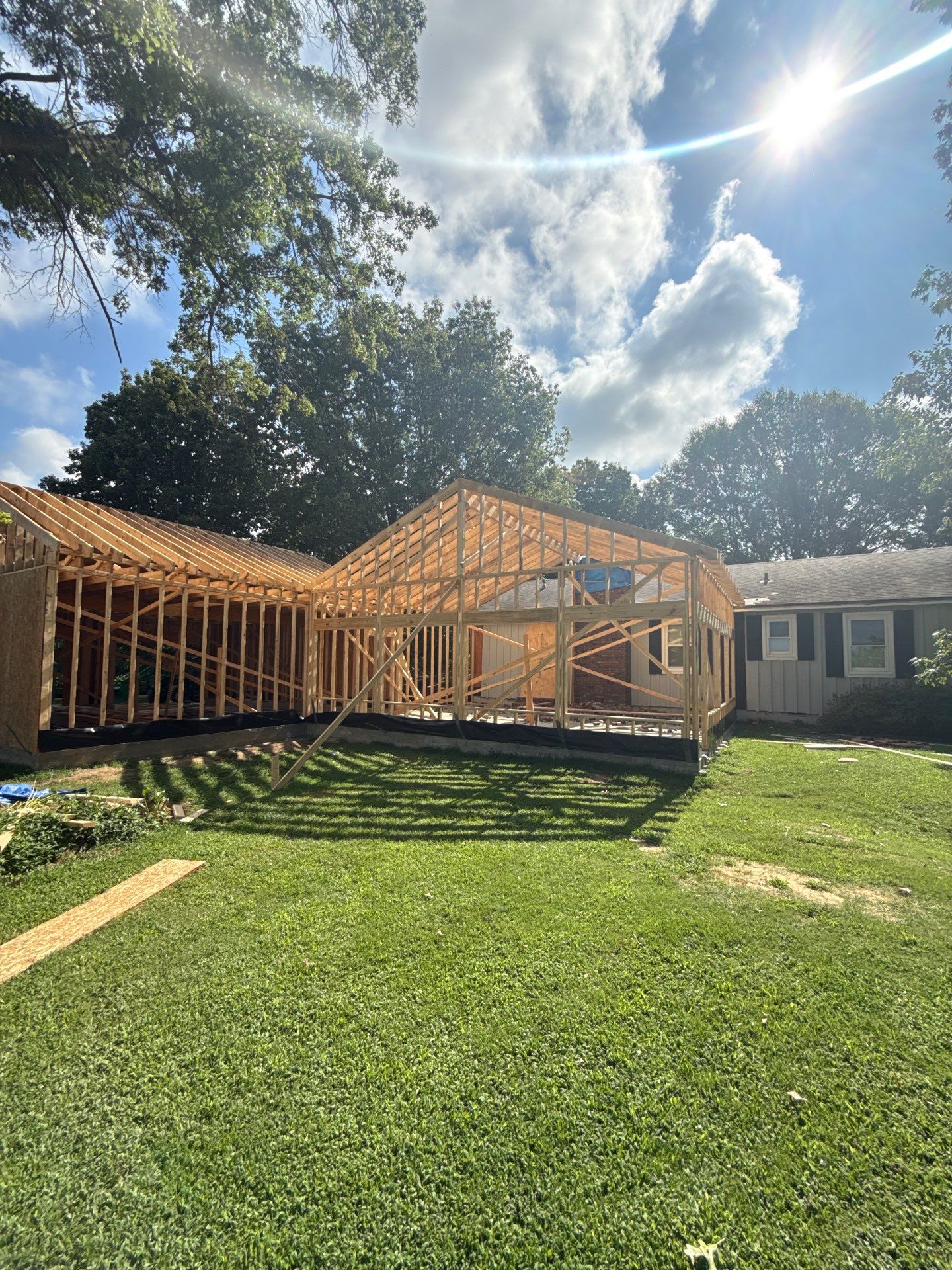 Sunroom and Garage Addition by Skilled Construction LLC