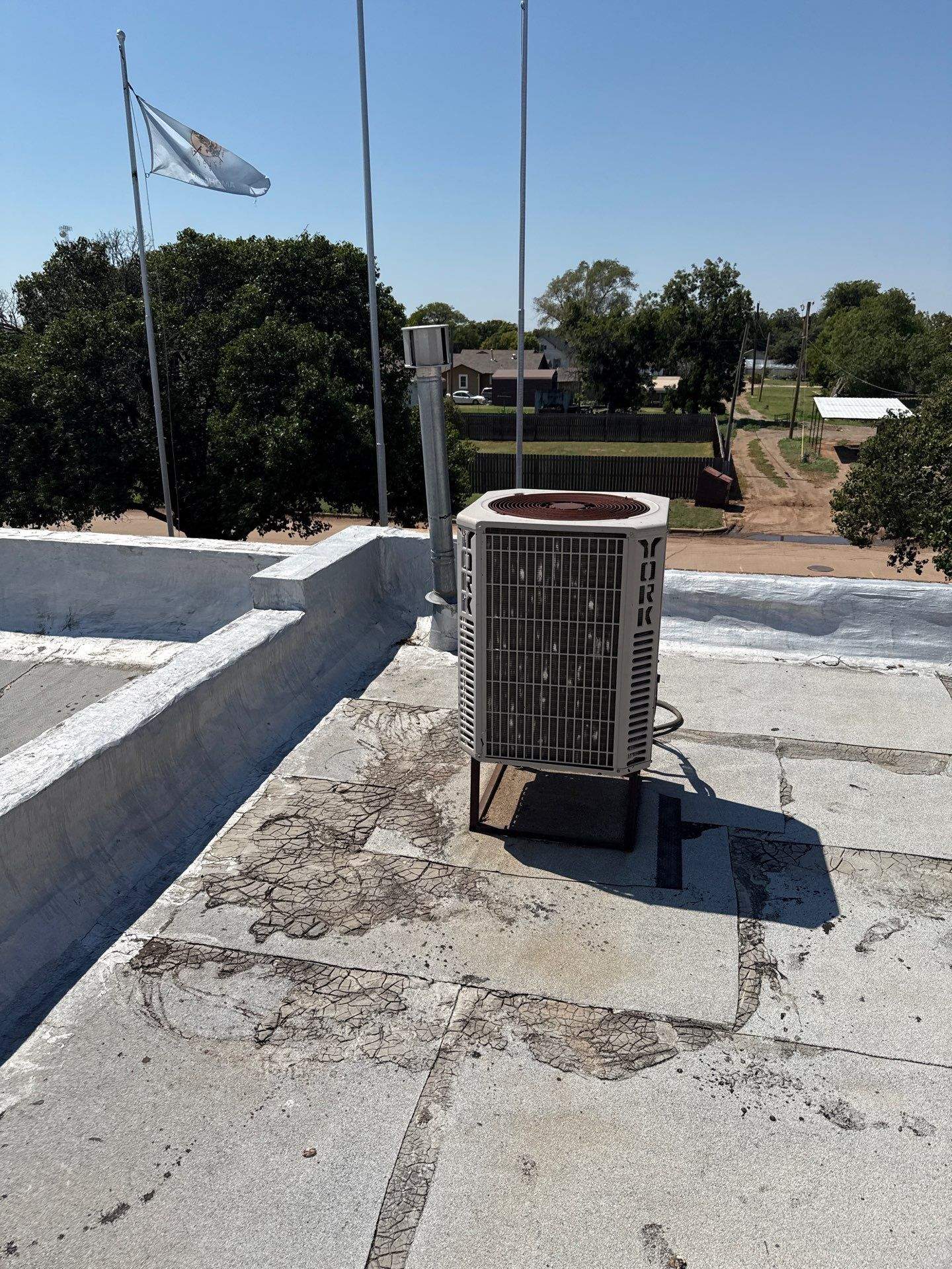 Hollis High School Comprehensive TPO Roof Replacement and Restoration by Secondary Rhodes