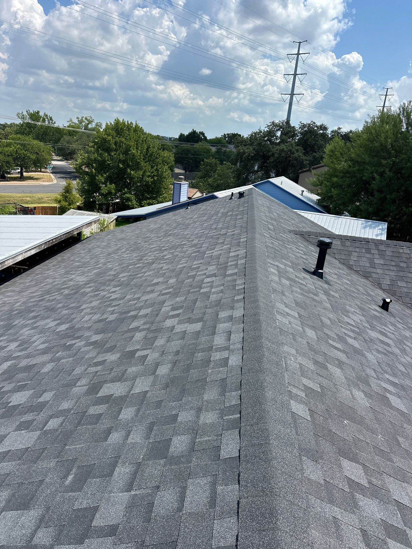 Residential Roofing Installation Owens Corning Tru Definition Onyx Black by DeZign Roofing & Exteriors