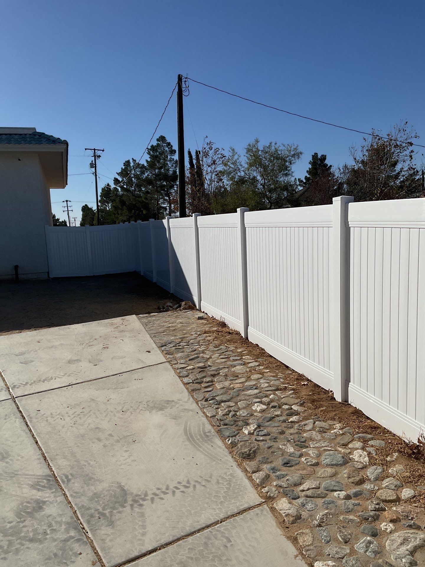 Fence Installation using Ranch Style Vinyl by Fence Guys Inc.