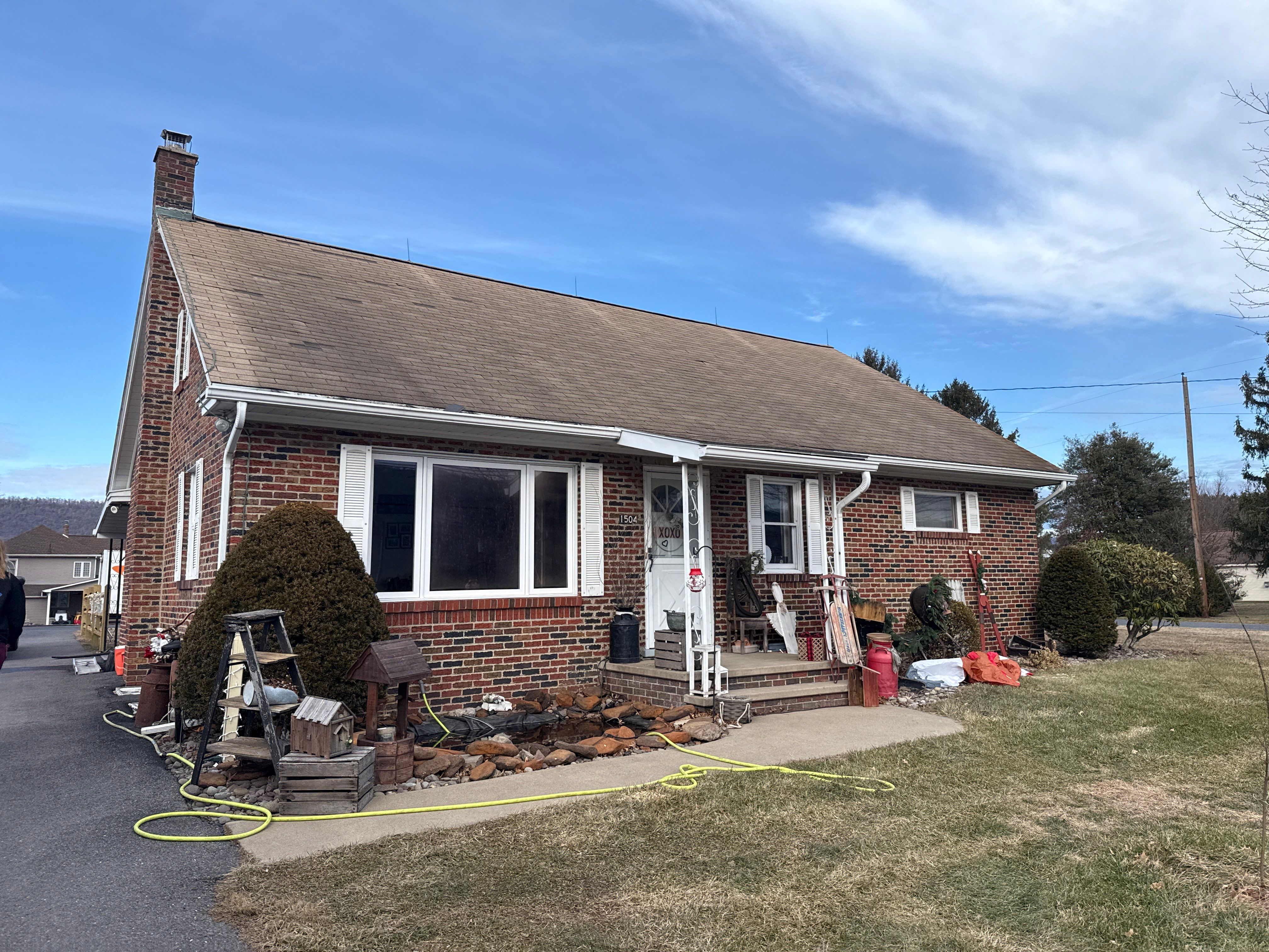 Tan Metal Roof and Gutter Replacement for Valley View Home by Esh Builders