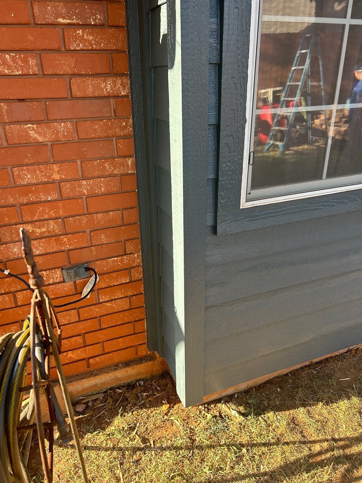 Siding Replacement and Exterior Painting in Edmond, OK by McCann's Roofing and Construction