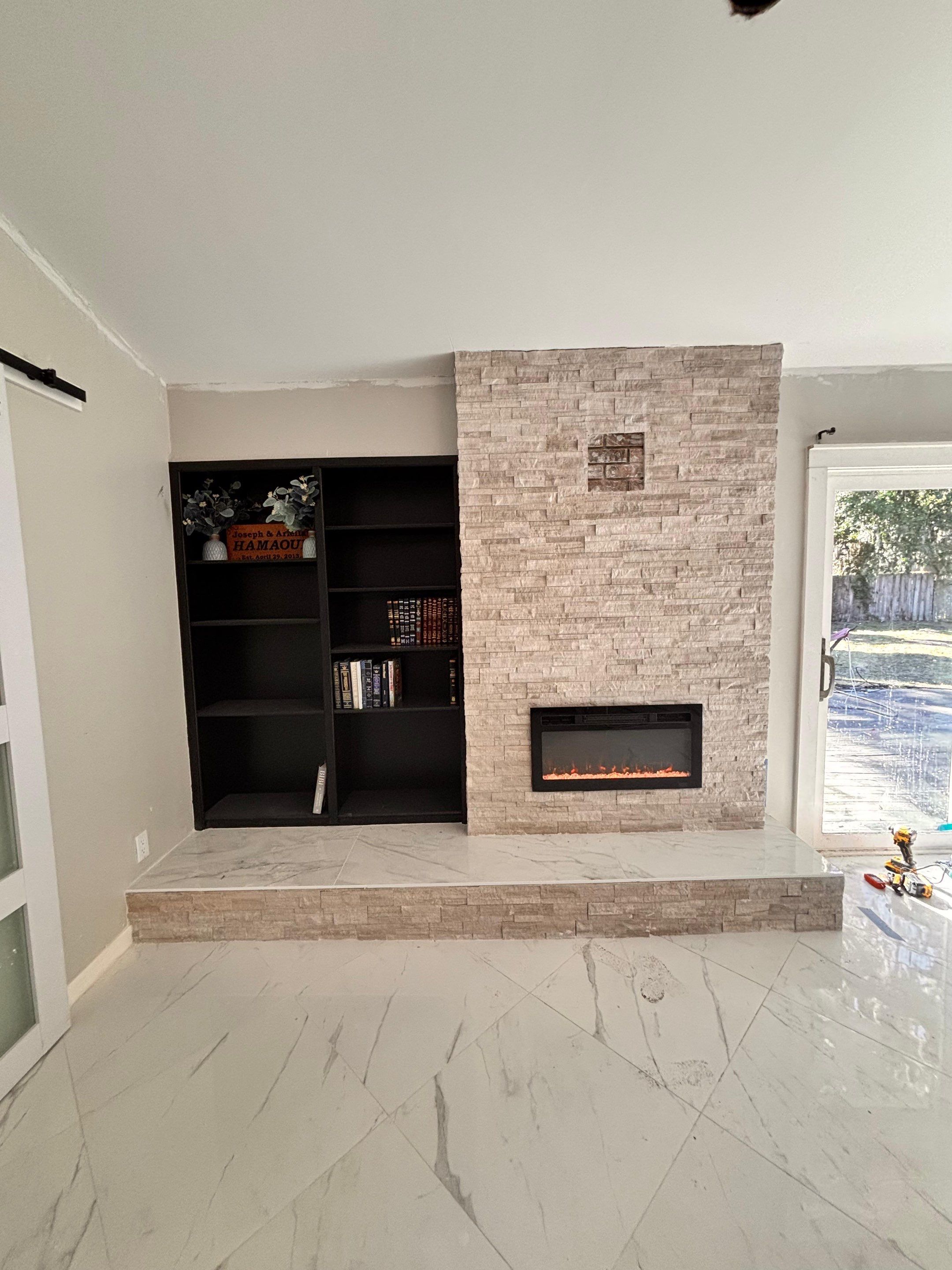 Master Bathroom, Children's Bathroom, and Fireplace Renovation by urban green energy llc