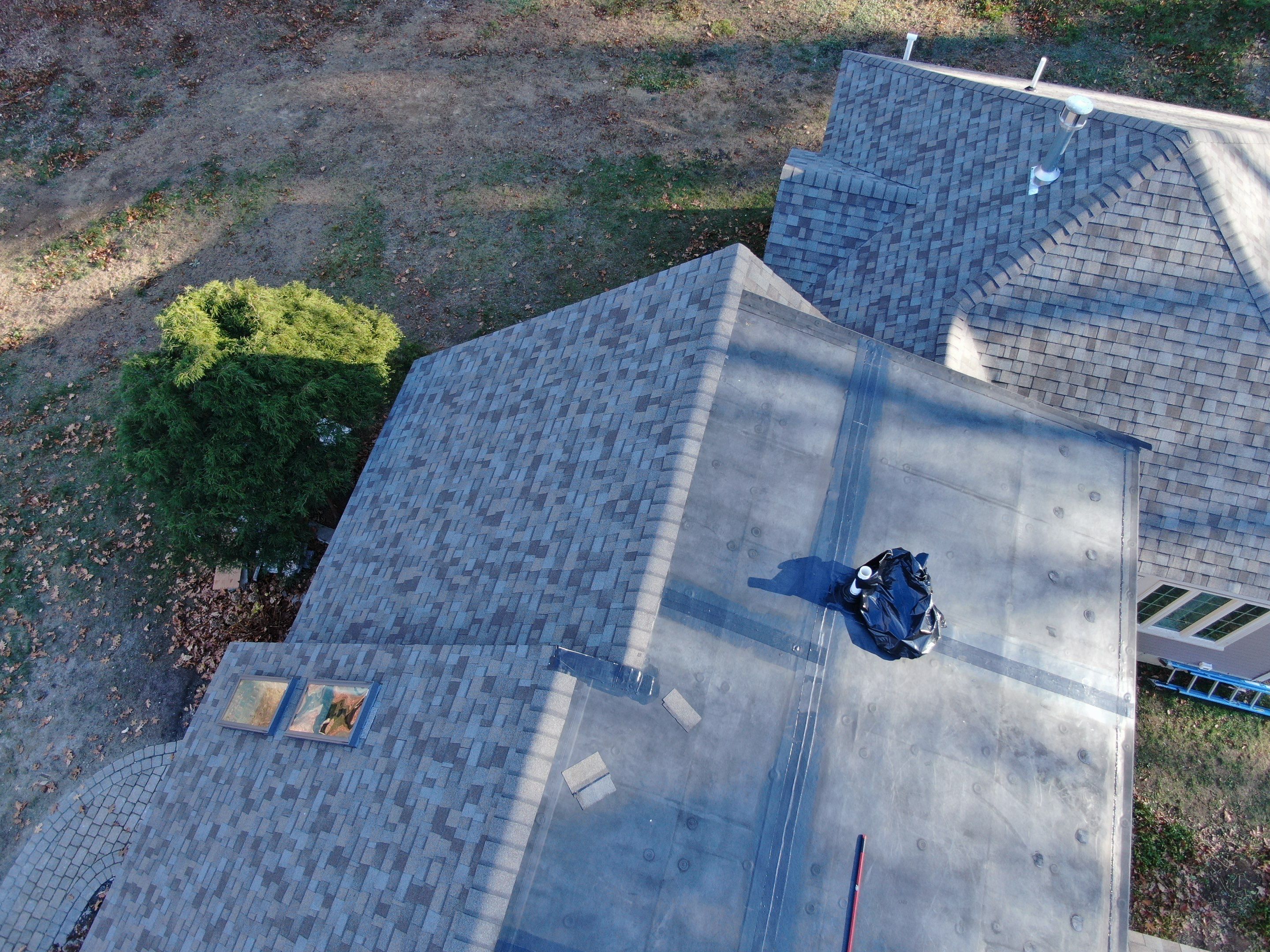 Complete House & Barn Roof with 13 Skylight Reflashing + EPDM Repairs by Mighty Dog Roofing of Greater Middlesex County