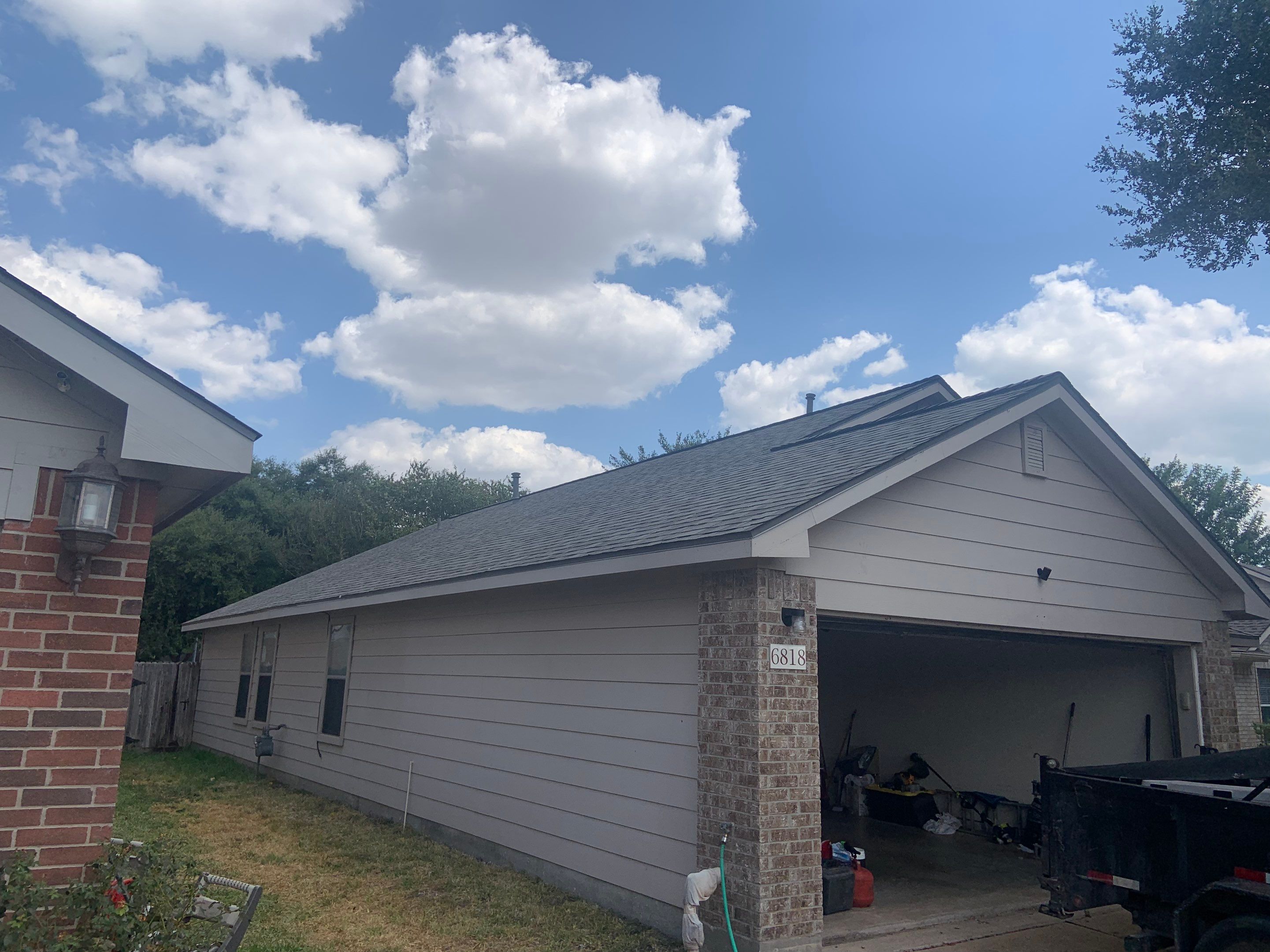 AMIG approved this roof for wind damage, fascia painting, and window work. by Roof Repair Company