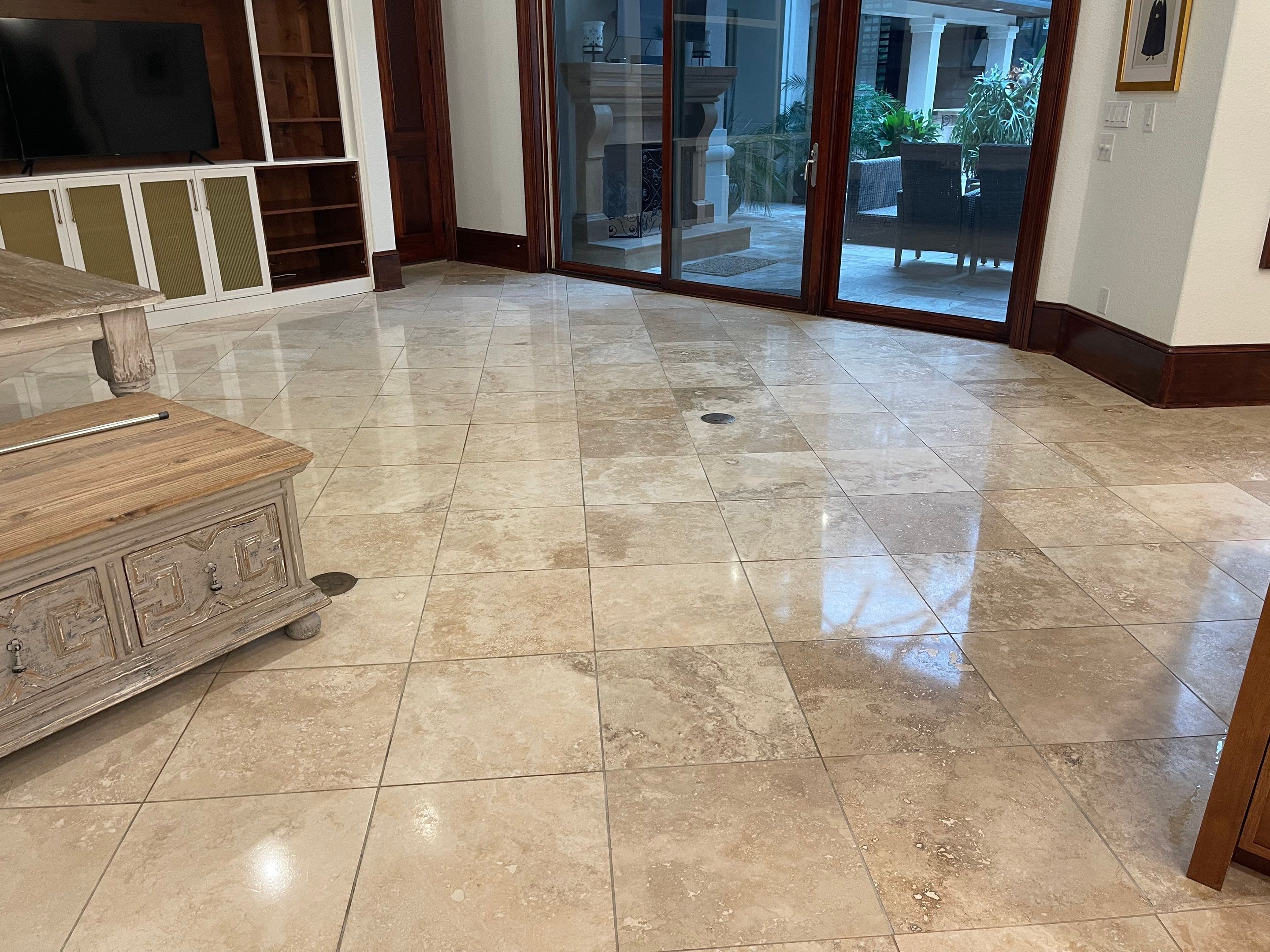 Polished Travertine Floor Restoration for Gulf Shores Residence by Cornerstone Hard Surface Restoration
