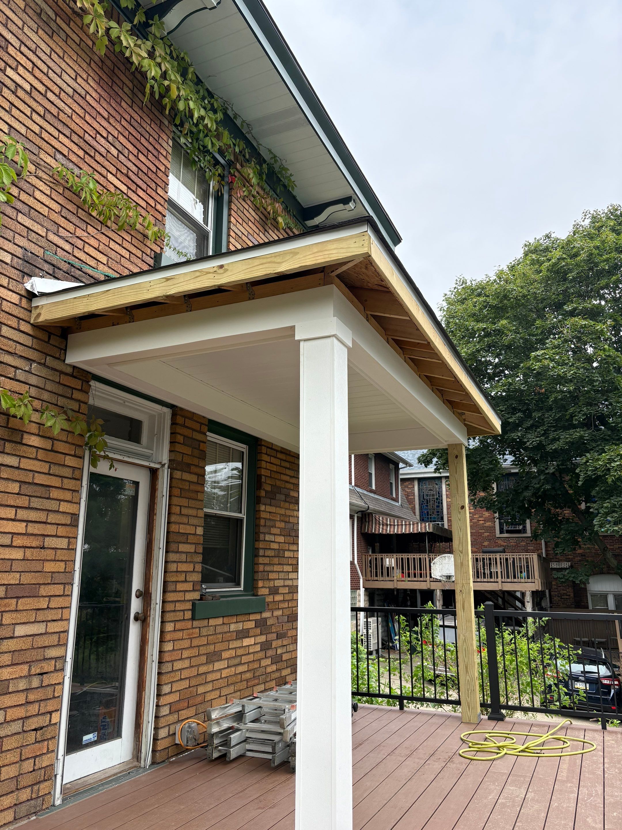 Deck and Roof build  by Cousins Roofing Siding & Decks