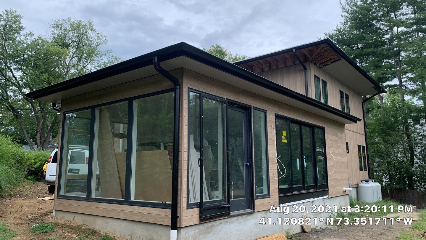 Black Gutters in wesport by A Plus Exterior