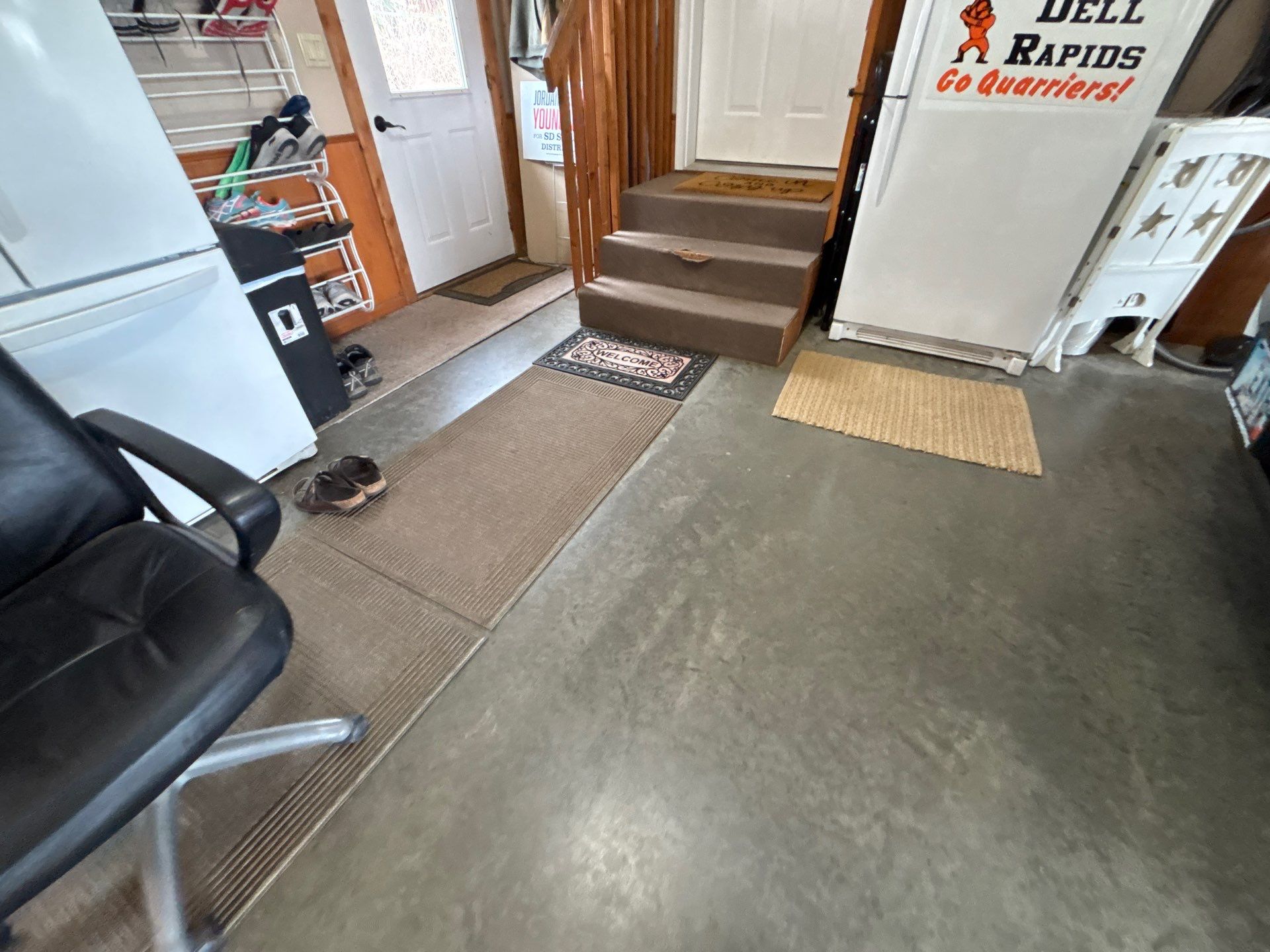 Multi-Fleck Epoxy Garage Floor Coating in Dell Rapids by Select Painting, Coatings & Garage Cabinets