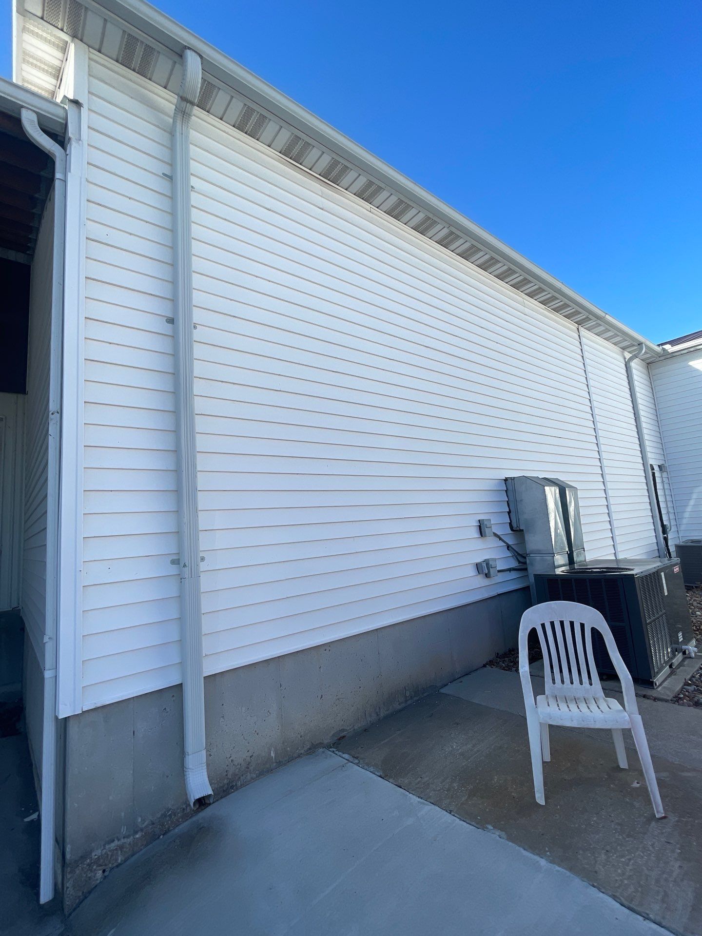 Siding and Stone Installation using Extrerior Porfolio Vinyl Siding and Versetta Stone by EEC  Windows, Siding & Roofing 