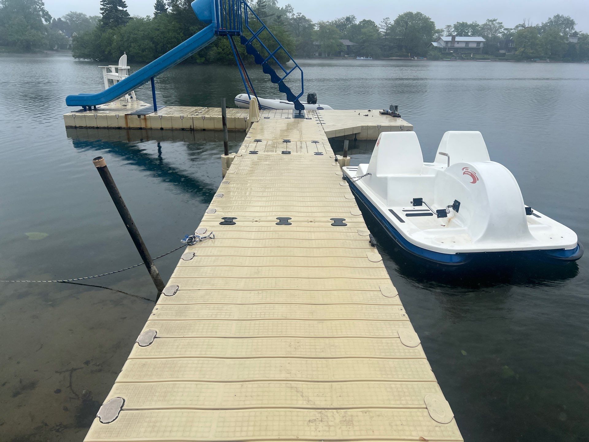 Power washing of floating dock by Northern Power Washing LLC.