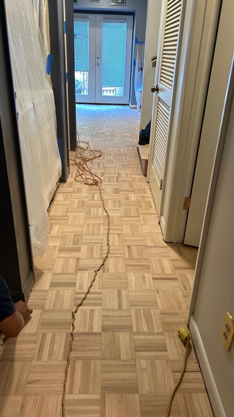 Parquet floor and stair treads by Footprints Floors of Nashville