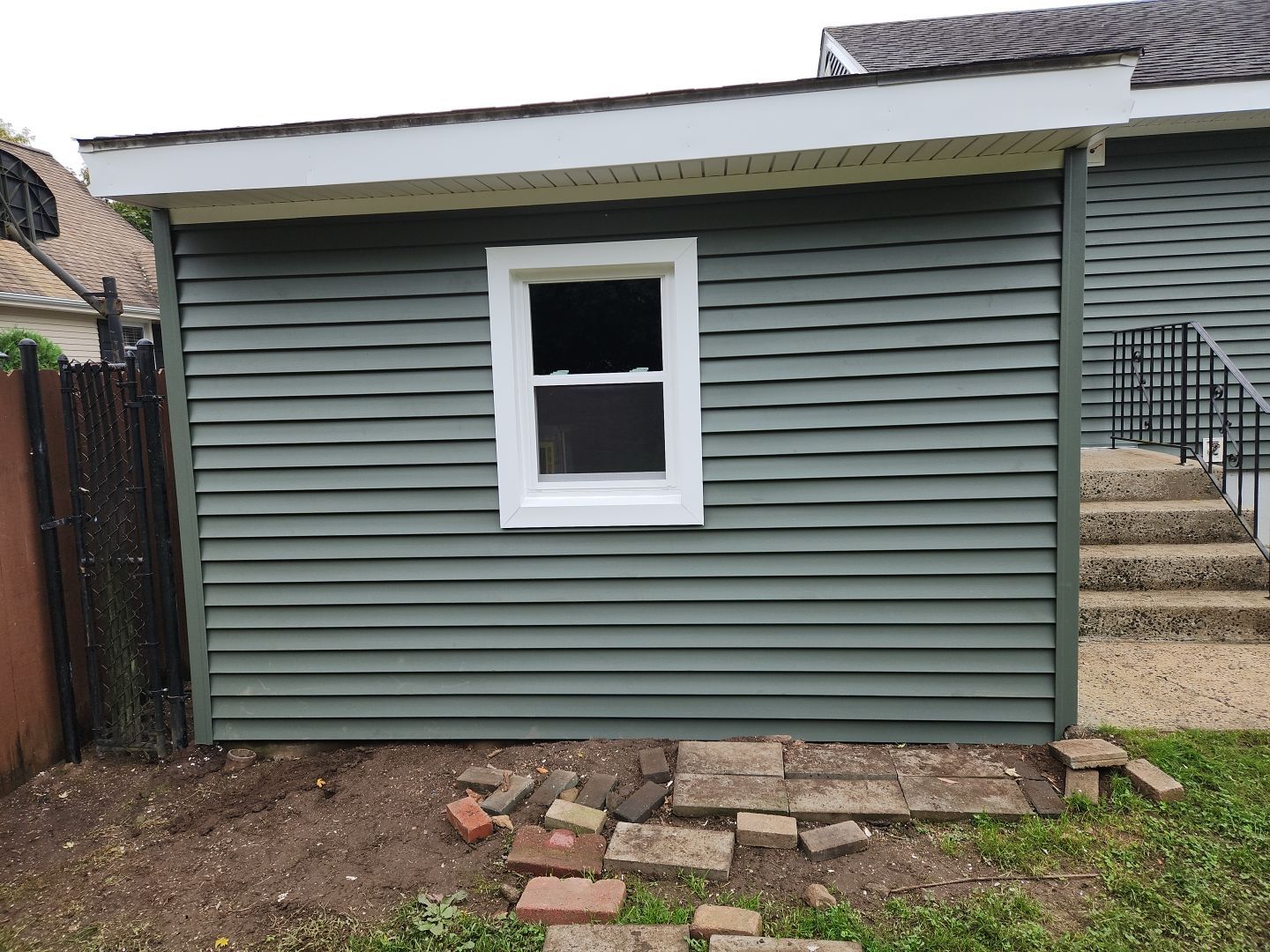 Siding Installation using Certainteed Monogram Forest Green by A Plus Exterior
