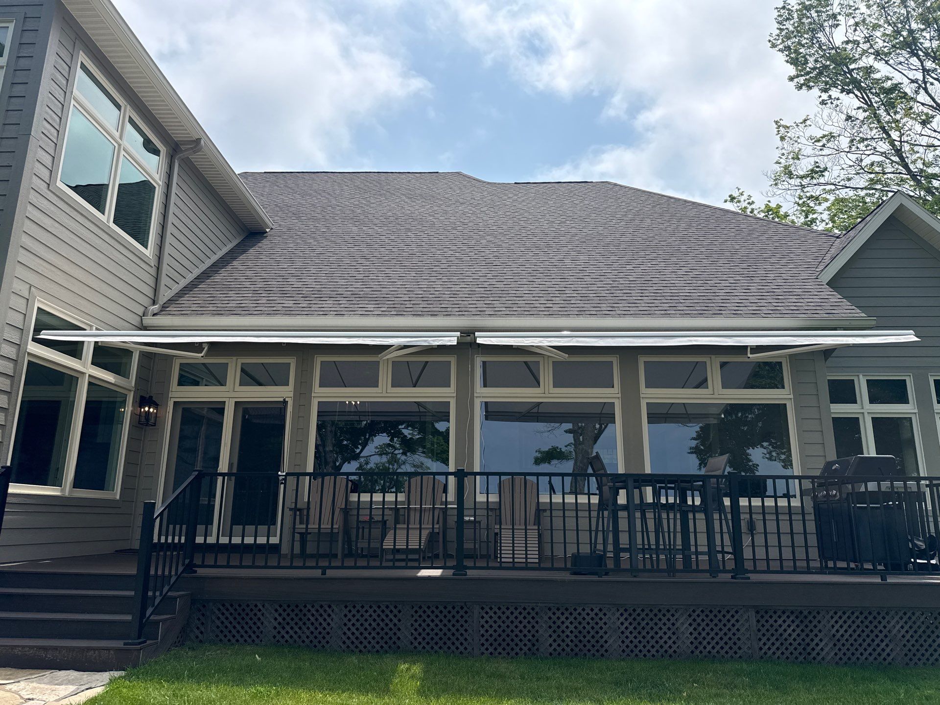 Sunesta Retractable Awning Installation for Sault Sainte Marie Lakeside Deck by Rainbow Seamless Systems
