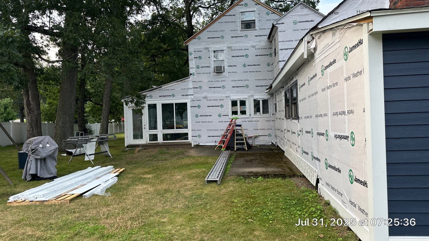 James Hardie Lap Siding Installation in Chelmsford, MA by Mighty Dog Roofing of Greater Middlesex County