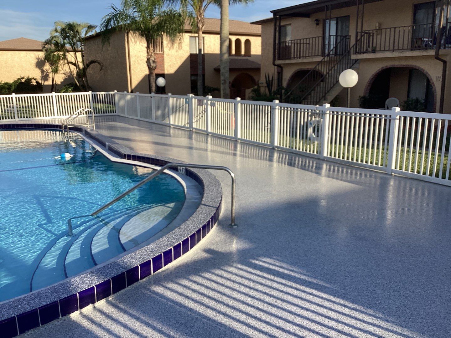Pool Deck using Orbit and Tidal Wave by Amvet concrete coatings llc
