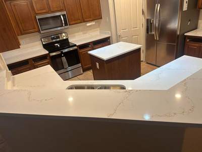 Rainier Gold White Quartz Countertop Installation and Kitchen Upgrade by Mena stone surfaces