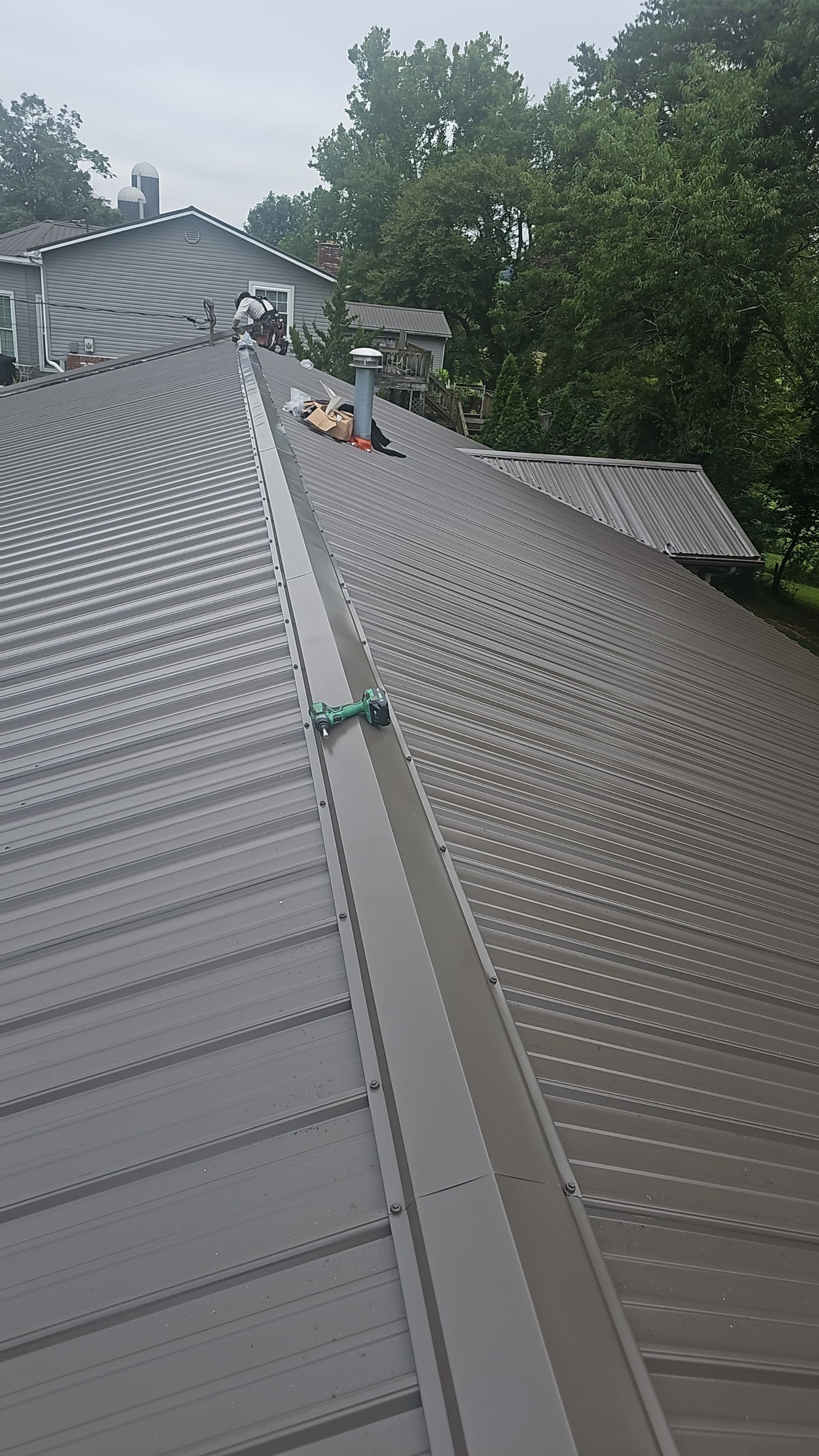 Residential Roofing Installation using Metal by Rainstoppers Roofing