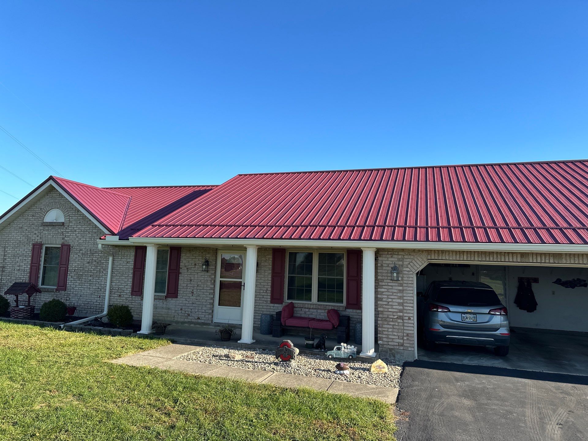 Residential Roofing Installation using Performance Panel Metal - Burgandy by RoofX 