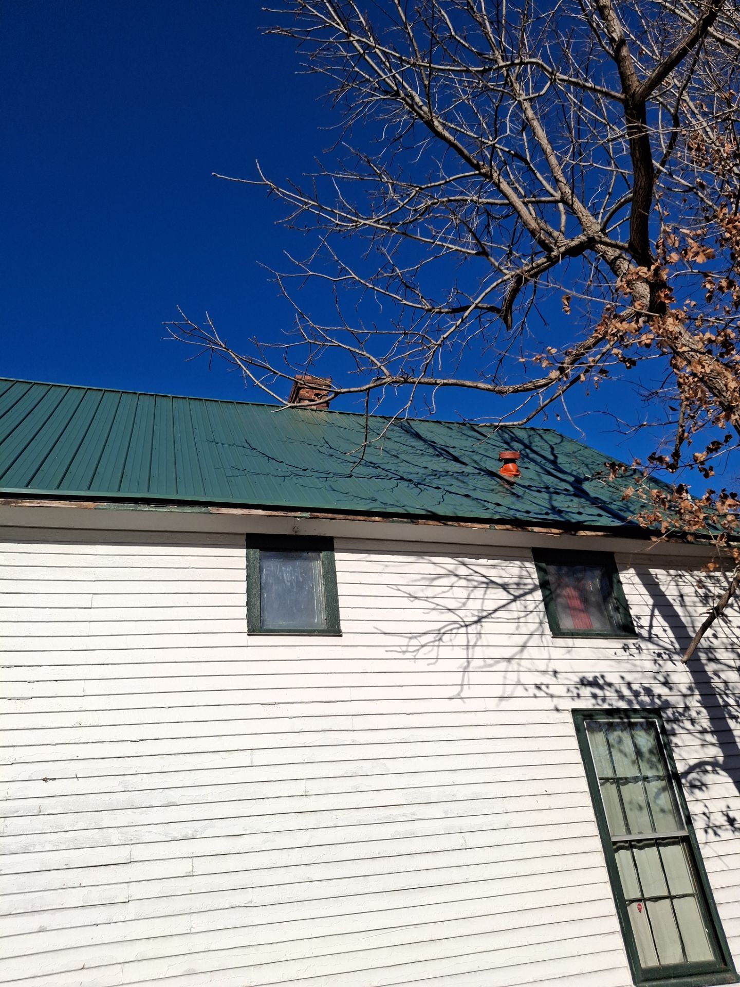 Residential Roofing Installation using Metal by Rainstoppers Roofing