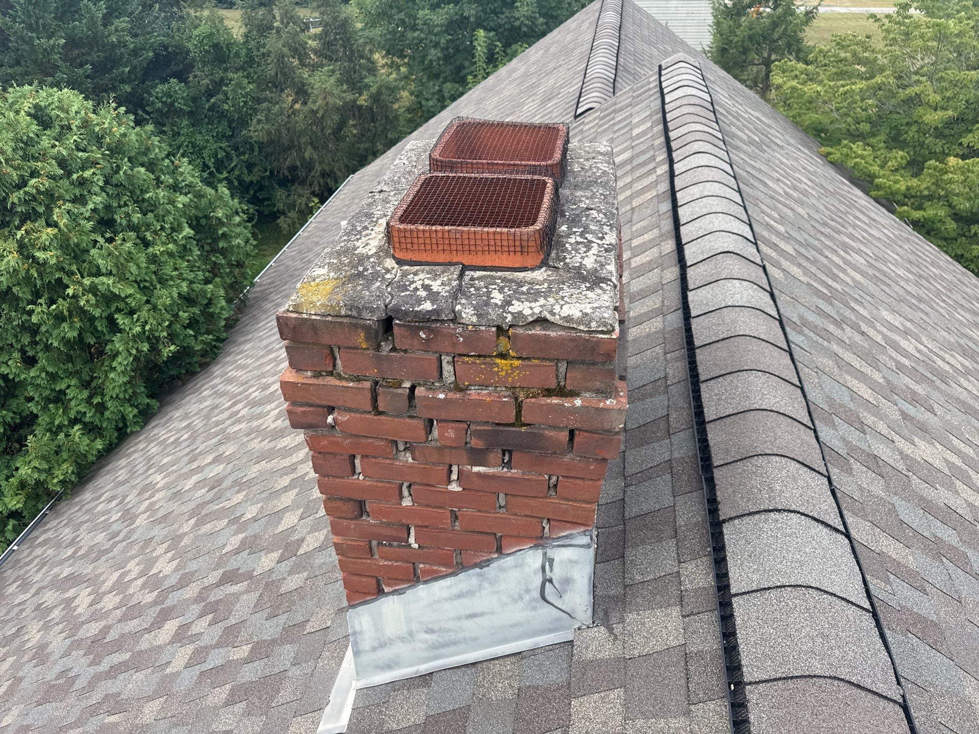 Complete Chimney Restoration and Gutter Guard Installation in Littlestown, PA by Bealing Roofing & Exteriors