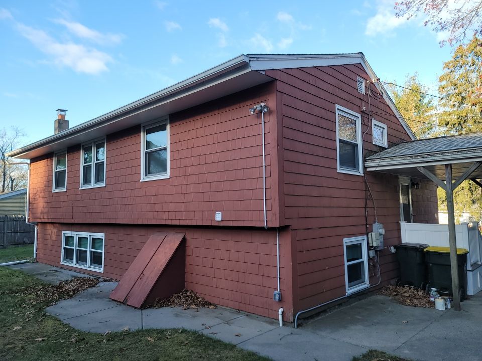 Siding Installation using Everlast Composite Siding by UBrothers Construction