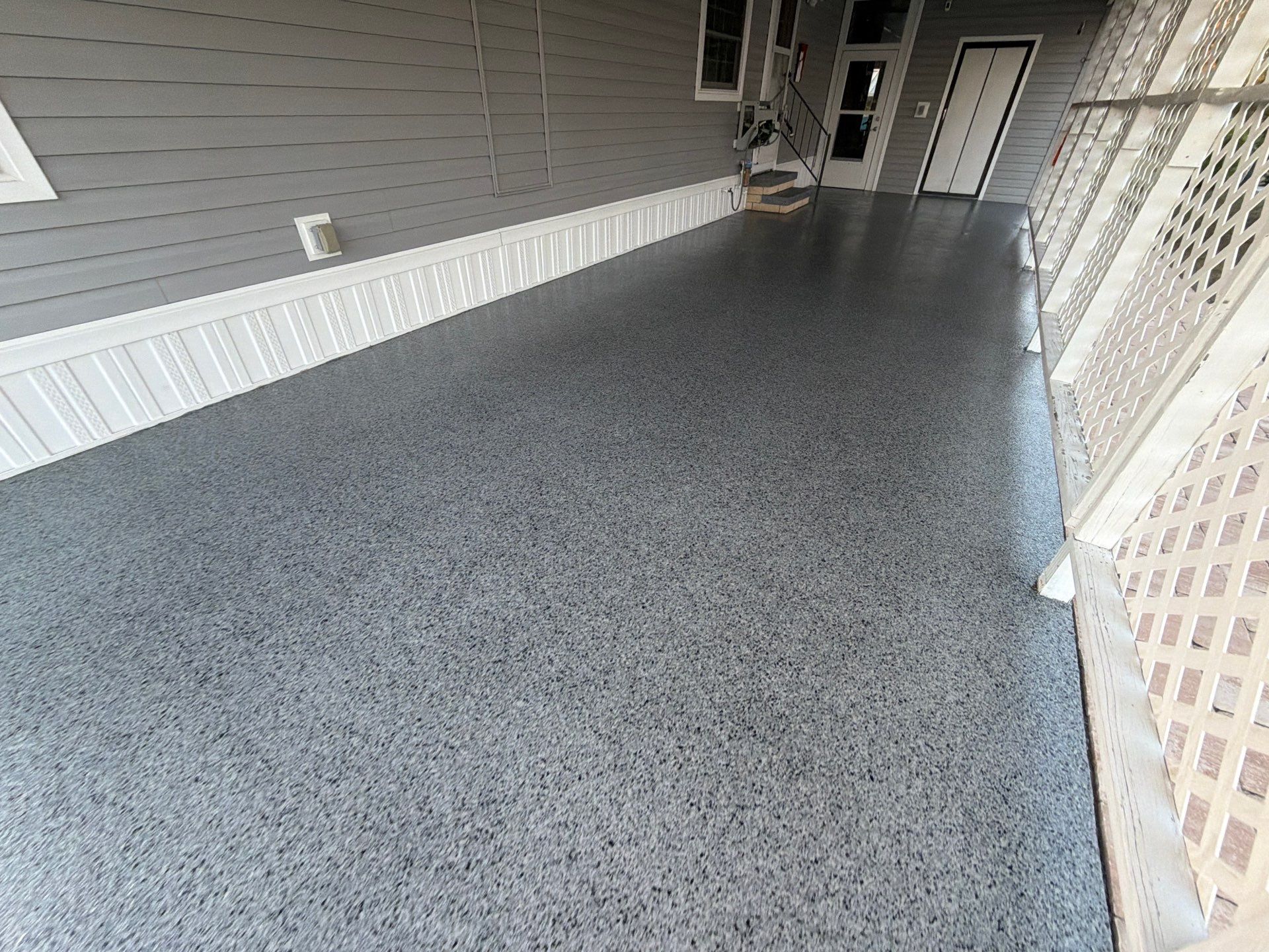 Driveway Transformation: Nightfall Flake System with Full UV & Moisture Protection by Performance Floors & Coating