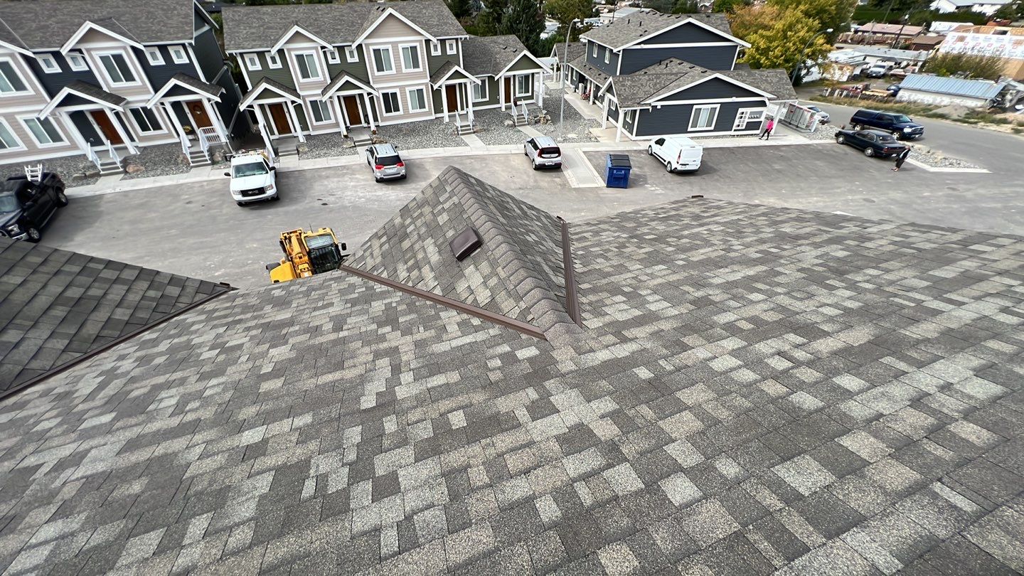 Residential Roofing Installation using OC Driftwood shingles by Top Notch Roofing Inc