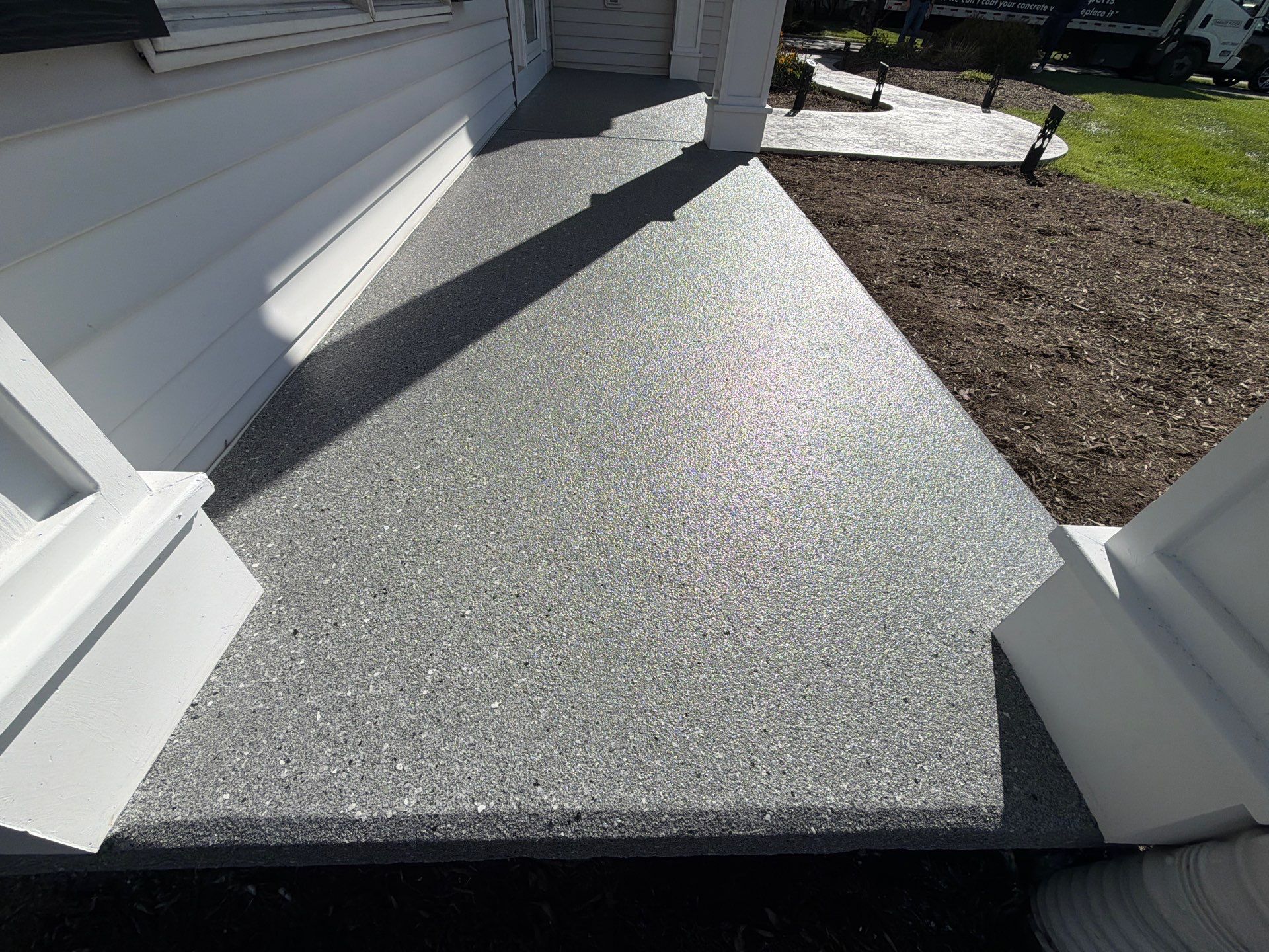 Artisan Aurora Front Porch Coating by NG Masonry & Construction LLC